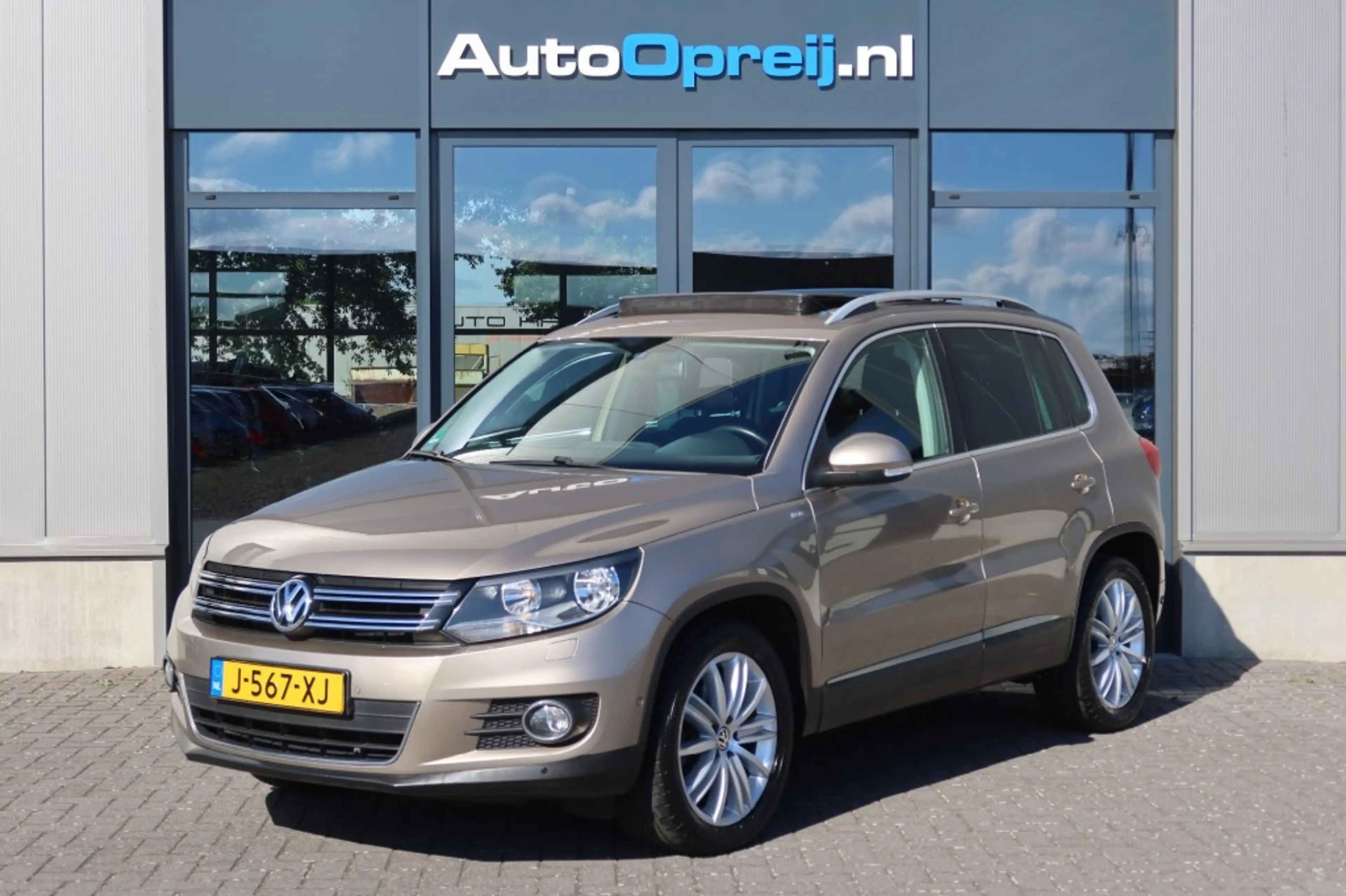 Volkswagen Tiguan 1.4 TSI 122pk Sport & Style Clima, NAVI, Schuif/ka