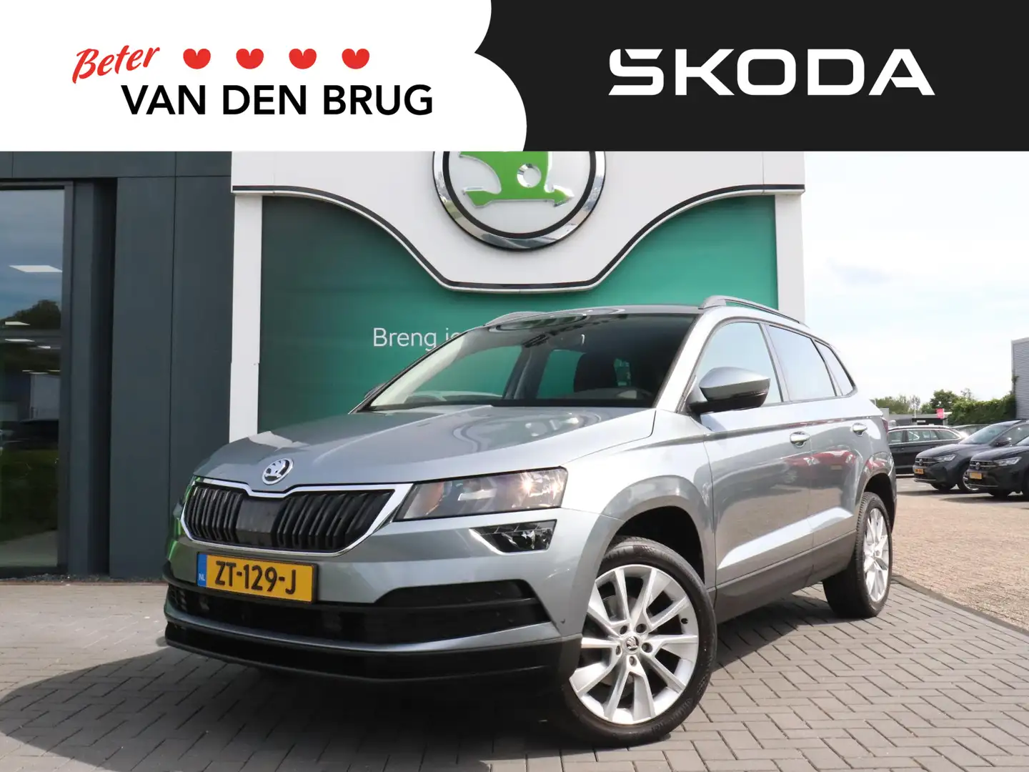 Skoda Karoq 1.5 TSI 150 pk ACT Ambition Business | Trekhaak | Grijs - 1