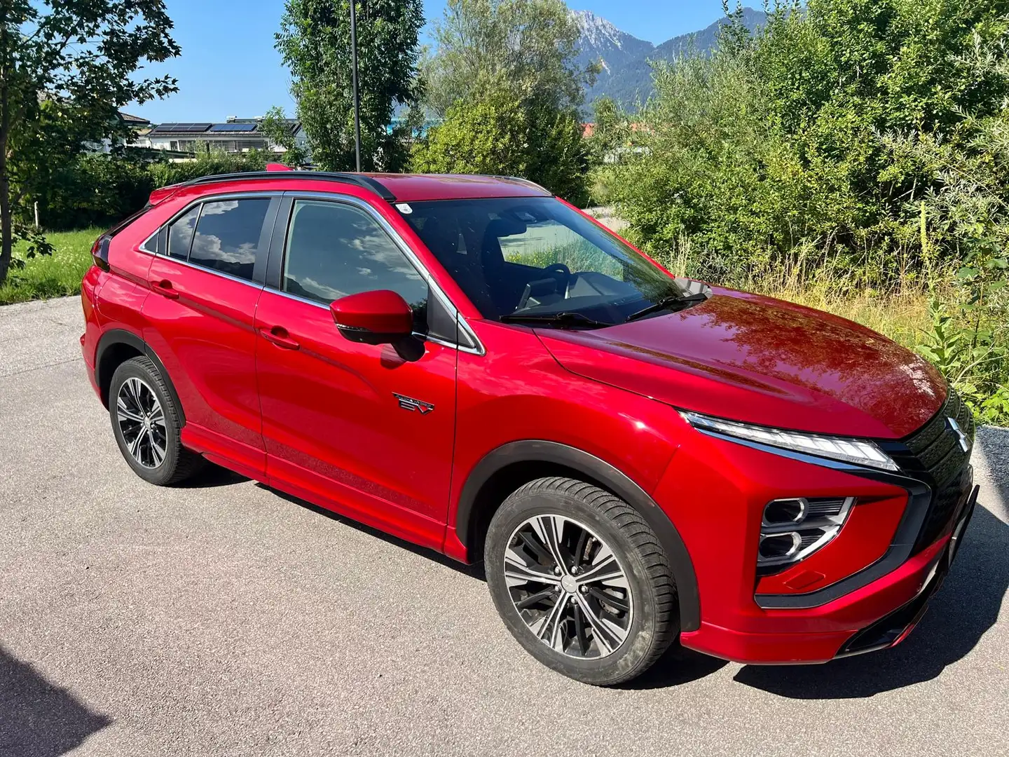 Mitsubishi Eclipse Cross Eclipse Cross 2,4 PHEV 4WD Top-Ausstattung Select CVT AHK 8-fach bereift Rot - 1