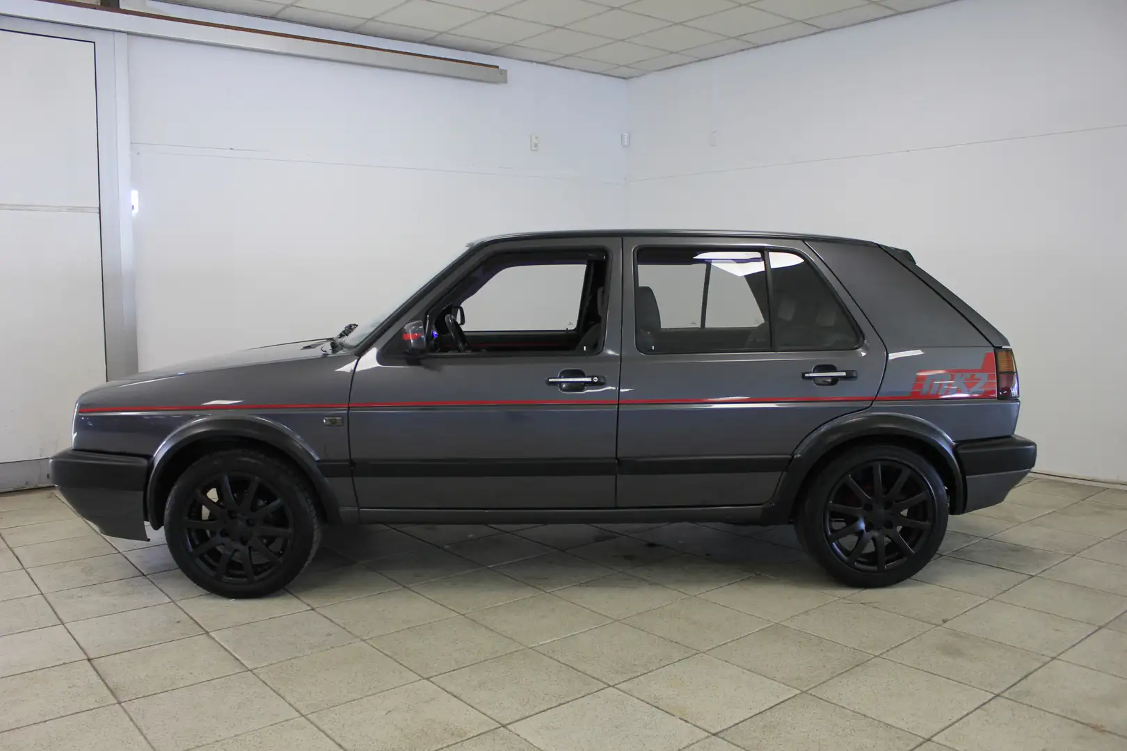 Volkswagen Golf 1.3 CL Inj. / PDC / SPORT / SMOKE / ELEK. PAKKET Grijs - 2