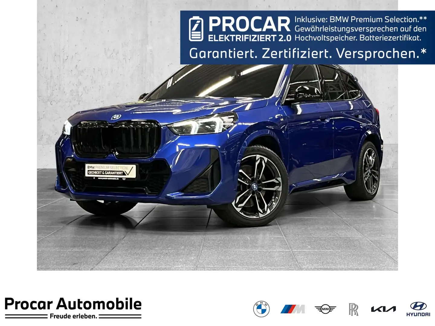BMW iX1 xDrive30 M Sport DA Prof PA+ HuD Pano AHK Blauw - 1
