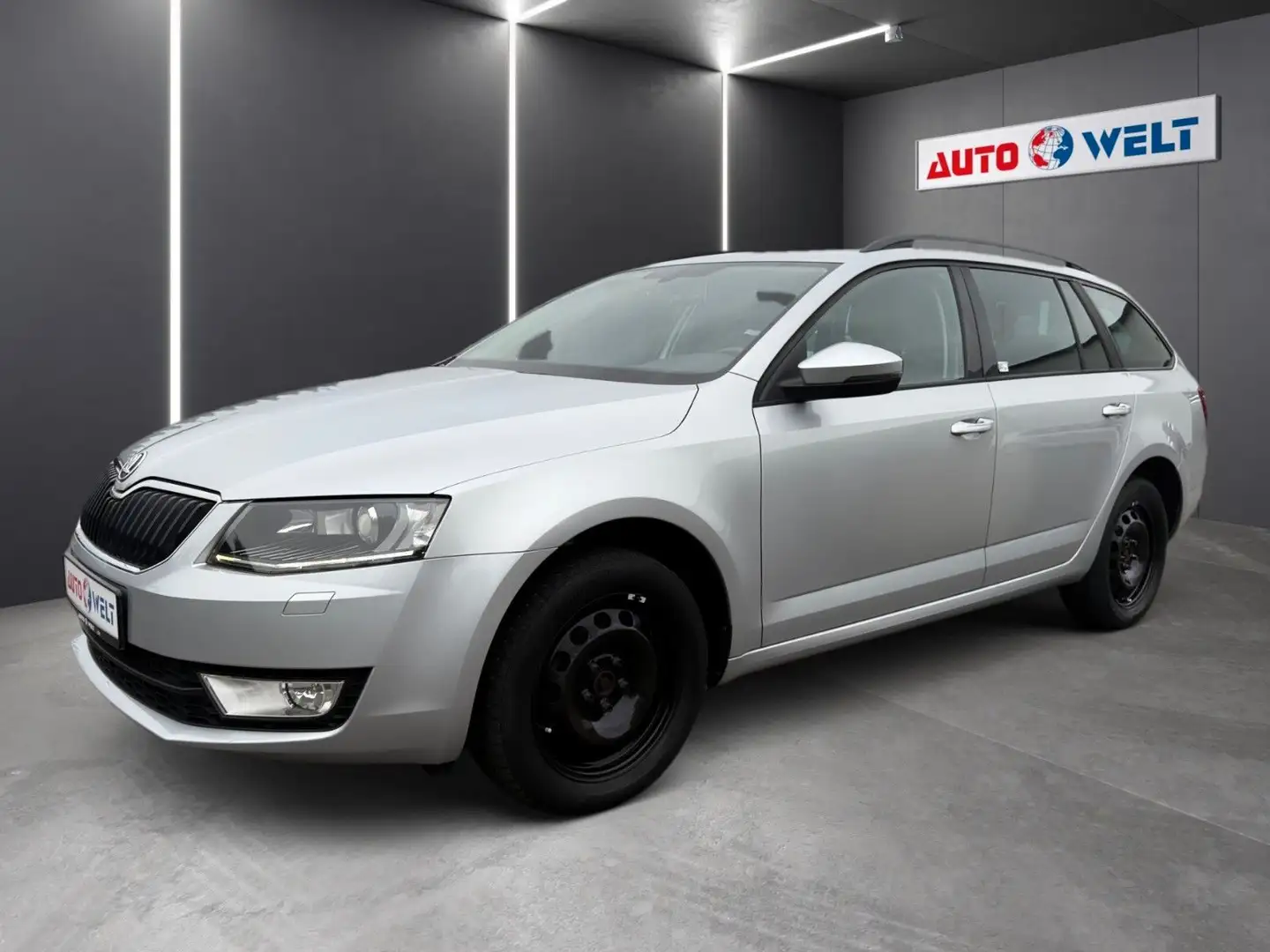 Skoda Octavia Kombi 2.0TDI 4x4 Xenon Navi Leder Pano Silber - 1