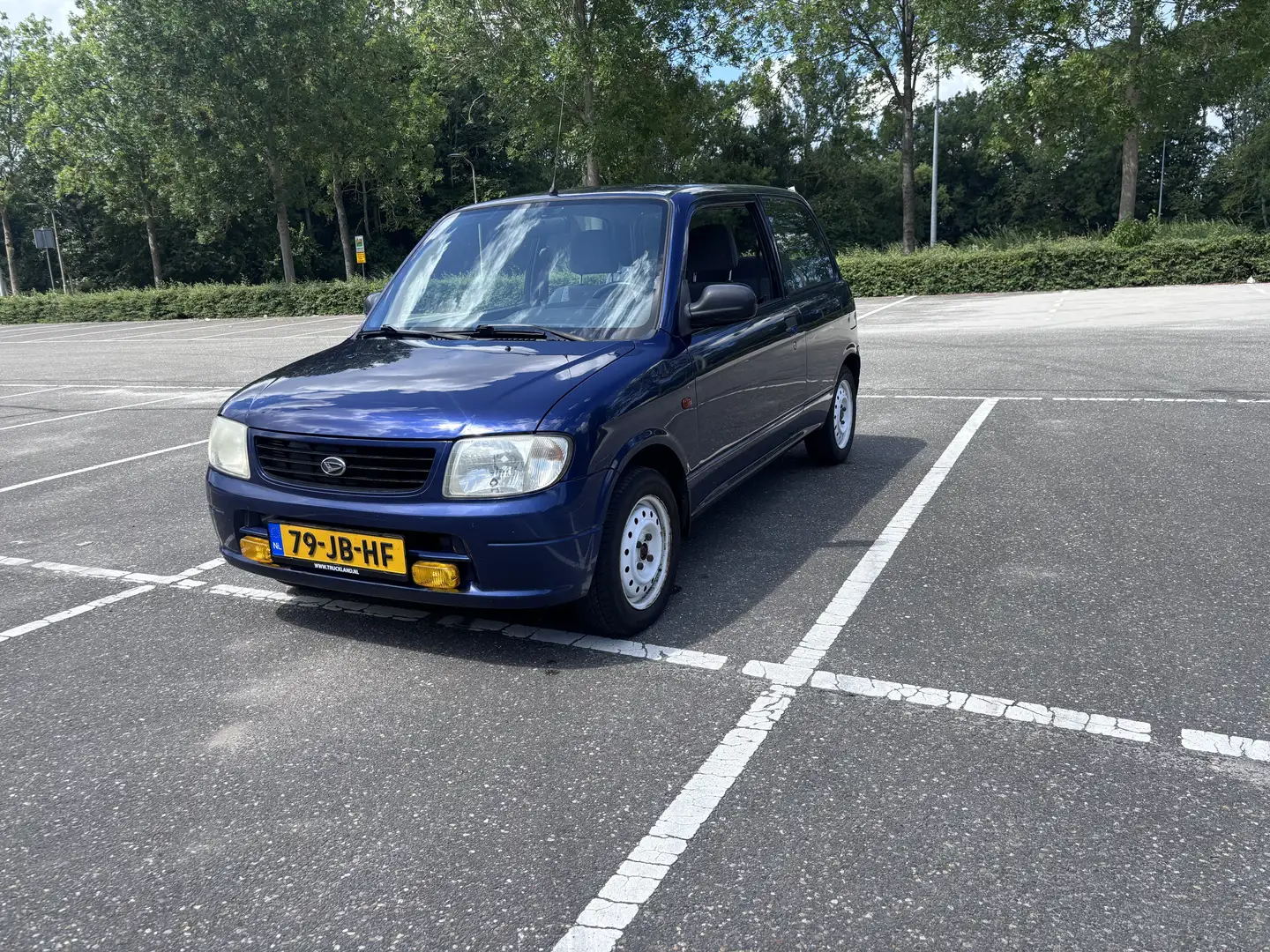 Daihatsu Cuore 1.0-12V DVVT XTi Blauw - 1