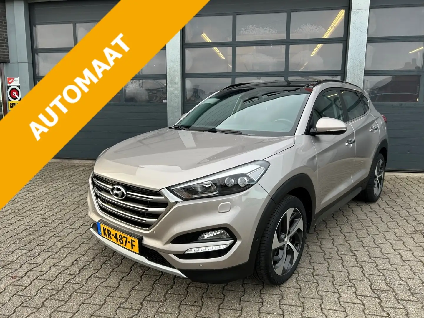 Hyundai TUCSON 1.6 T-GDi 177pk 4WD 7-DCT Premium Gris - 1