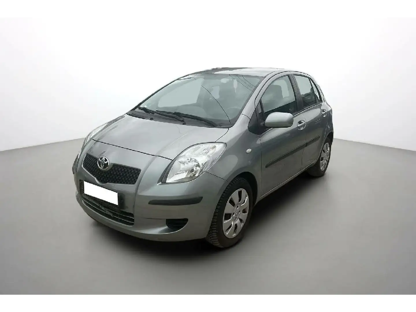 Toyota Yaris II 1.3 - 87 VVT-i Sol Gris - 1