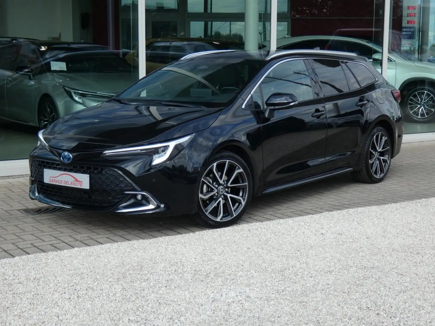 Toyota Corolla TS 1.8 Hybrid Premium 140pk FACELIFT +Elekt koffer Noir - 1