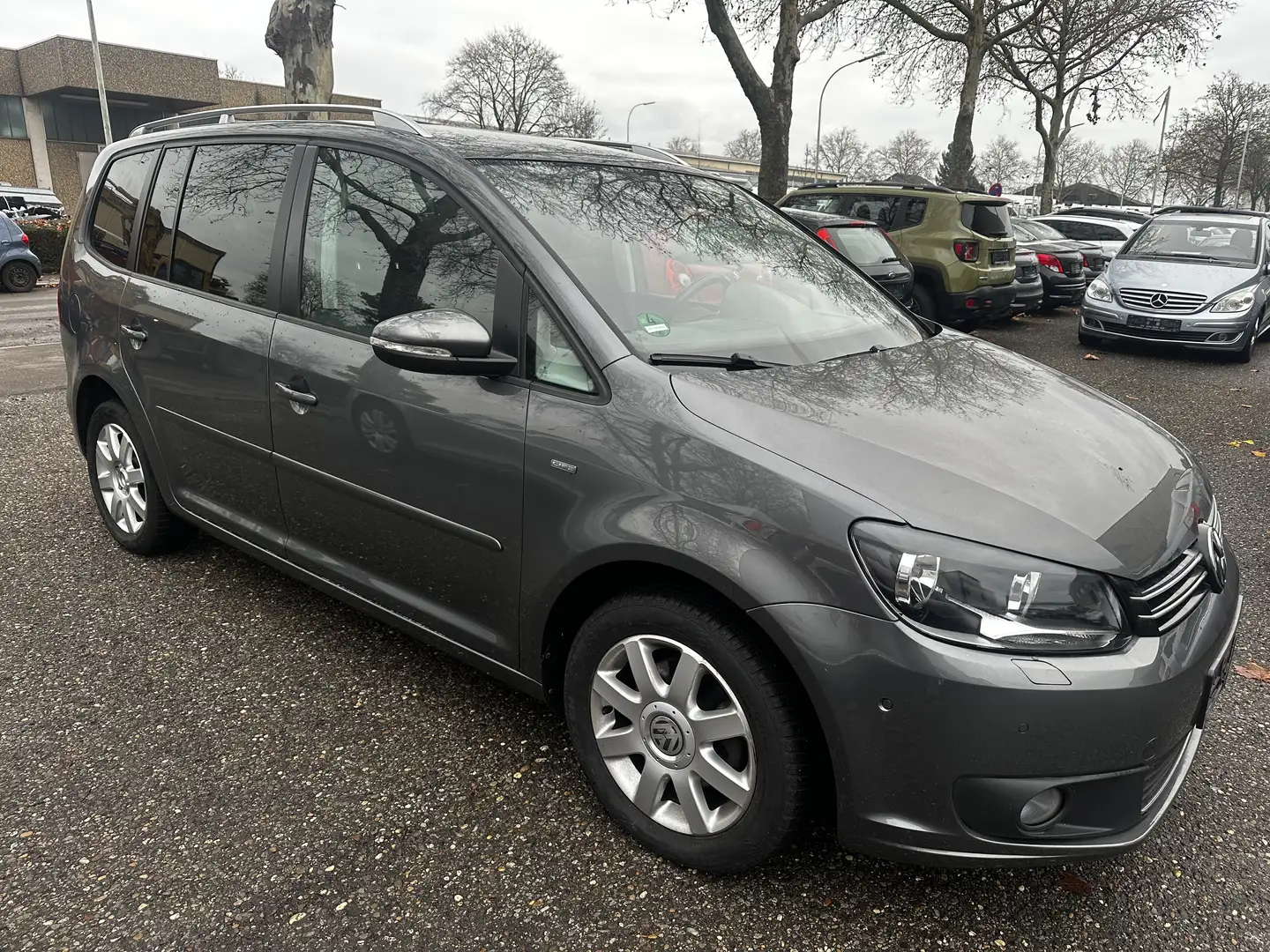 Volkswagen Touran Life 1,2 TSI | TüV Neu |1.Hand | Navi | Klima | Grau - 1