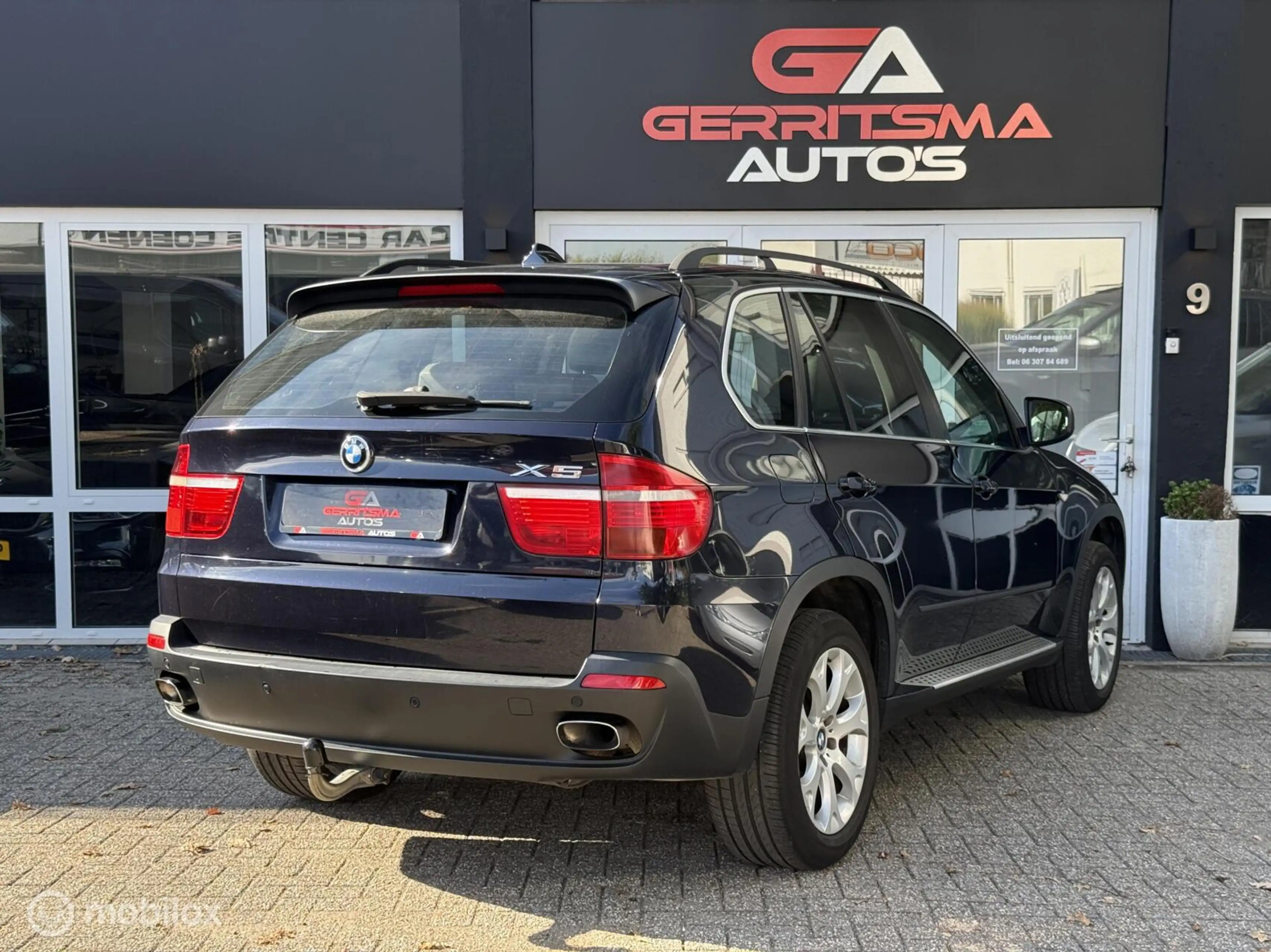 BMW X5 xDrive48i High Executive 7 pers — photo 5