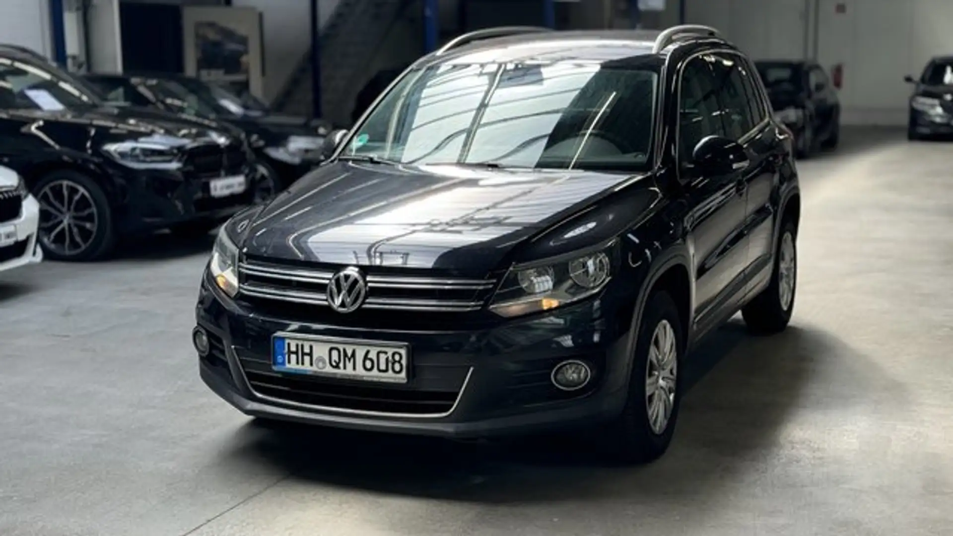 Volkswagen Tiguan Sport & Style BMT/DACHRELING/NAVI/KLIMA/ Schwarz - 1