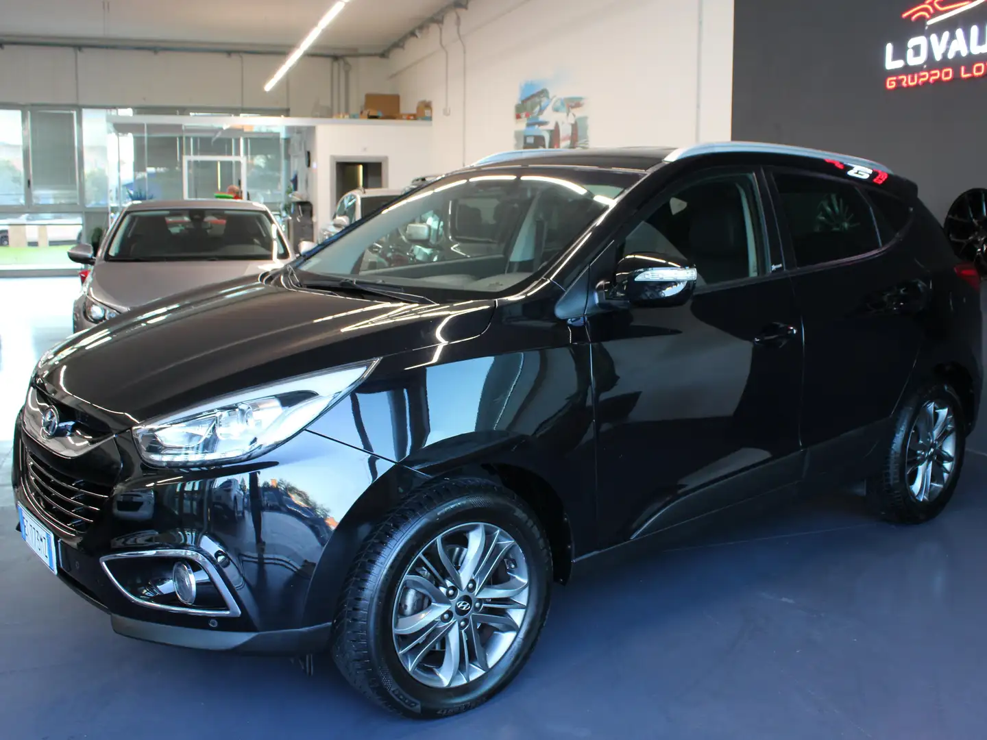 Hyundai iX35 ix35 2.0 crdi Xpossible 4wd 136cv auto Zwart - 1