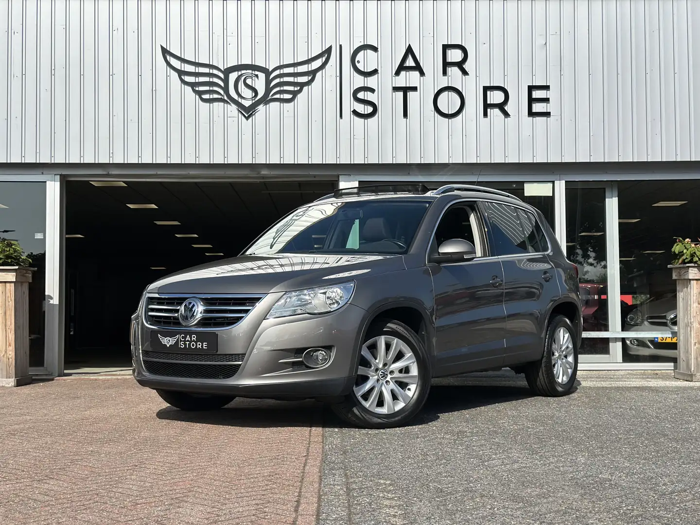 Volkswagen Tiguan 1.4 TSI Sport&Style |PANO|AIRCO|CRUISE|PDC|LM VELG Grigio - 1