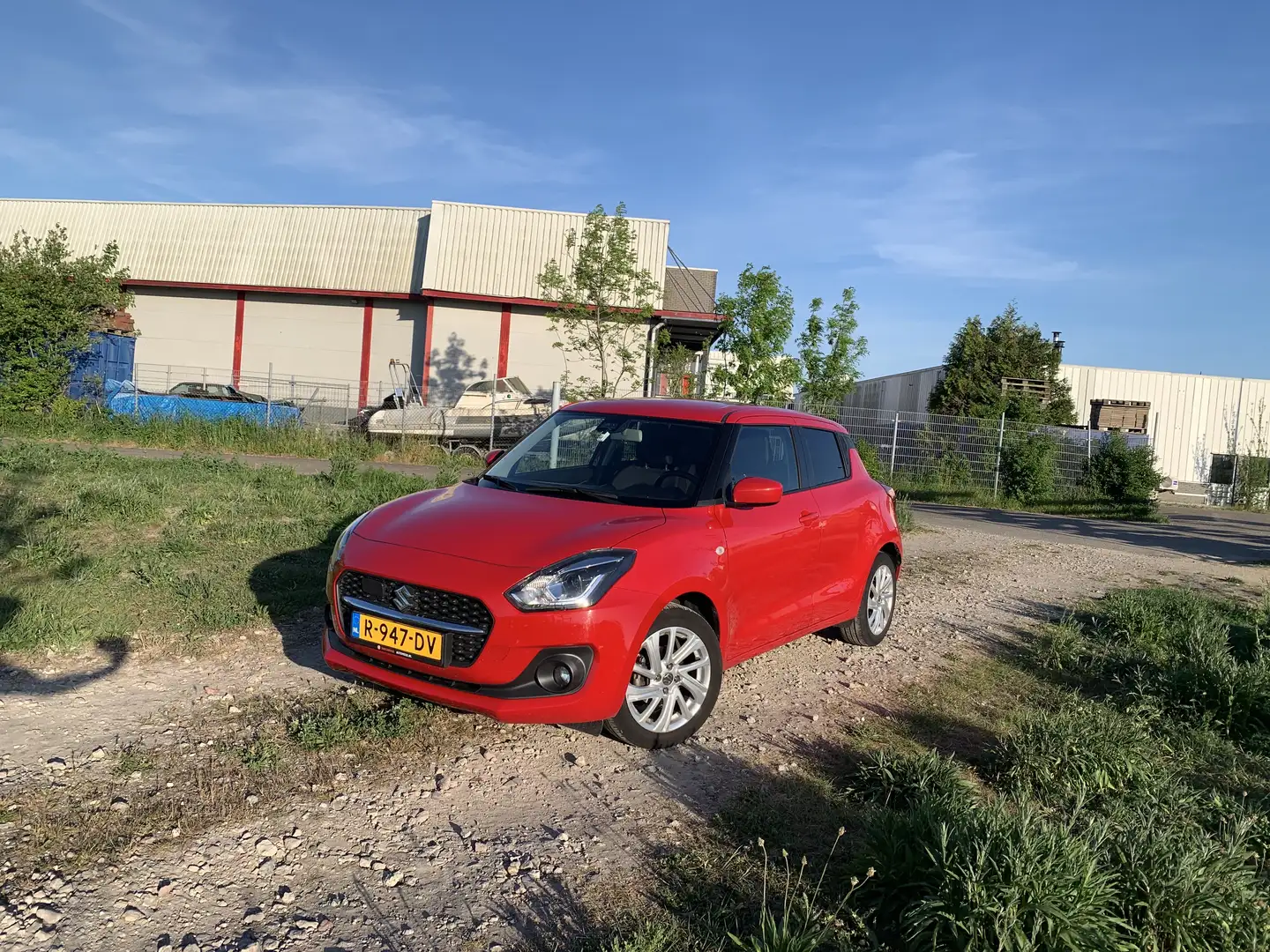 Suzuki Swift 1.2 Style Smart Hybride Rood - 1