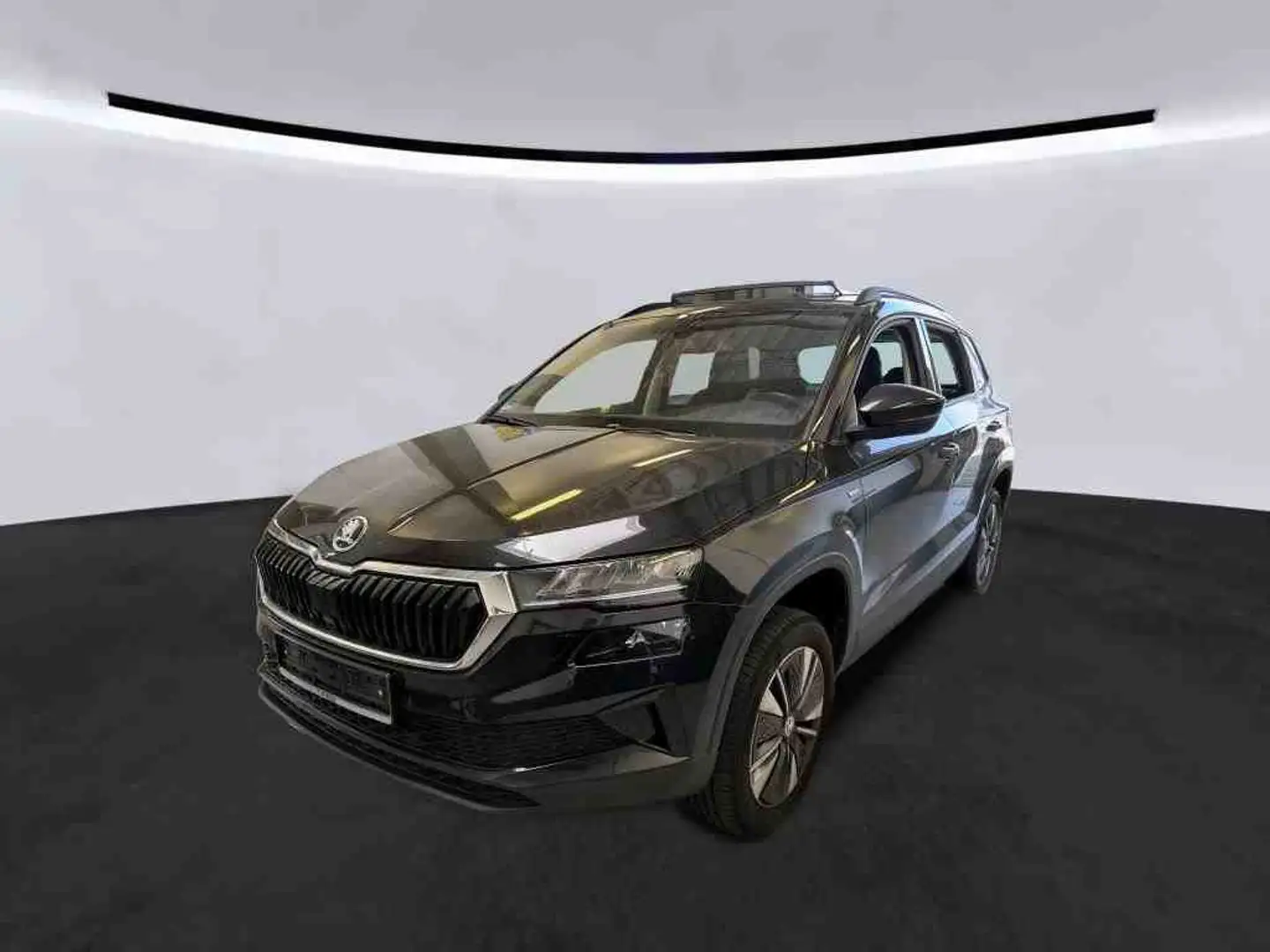 Skoda Karoq Tour 2.0 TDI AHK Pano Matrix RearView 2x Sitzh. AH Schwarz - 1