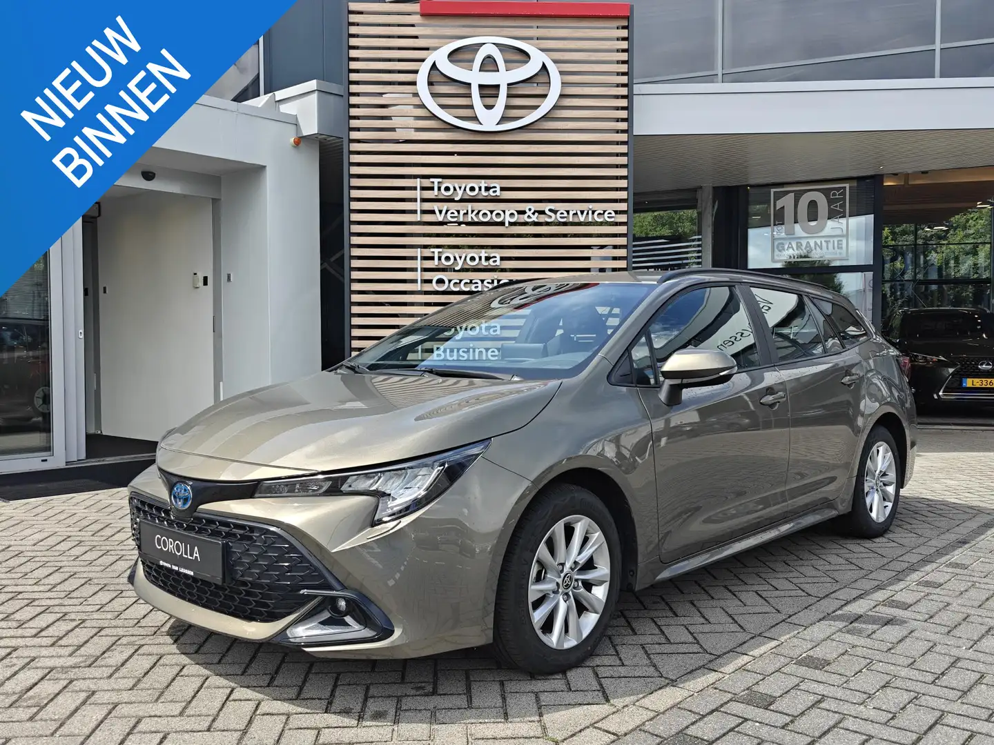 Toyota Corolla Touring Sports Hybrid 140 Dynamic NAVI STOEL/STUUR Groen - 1