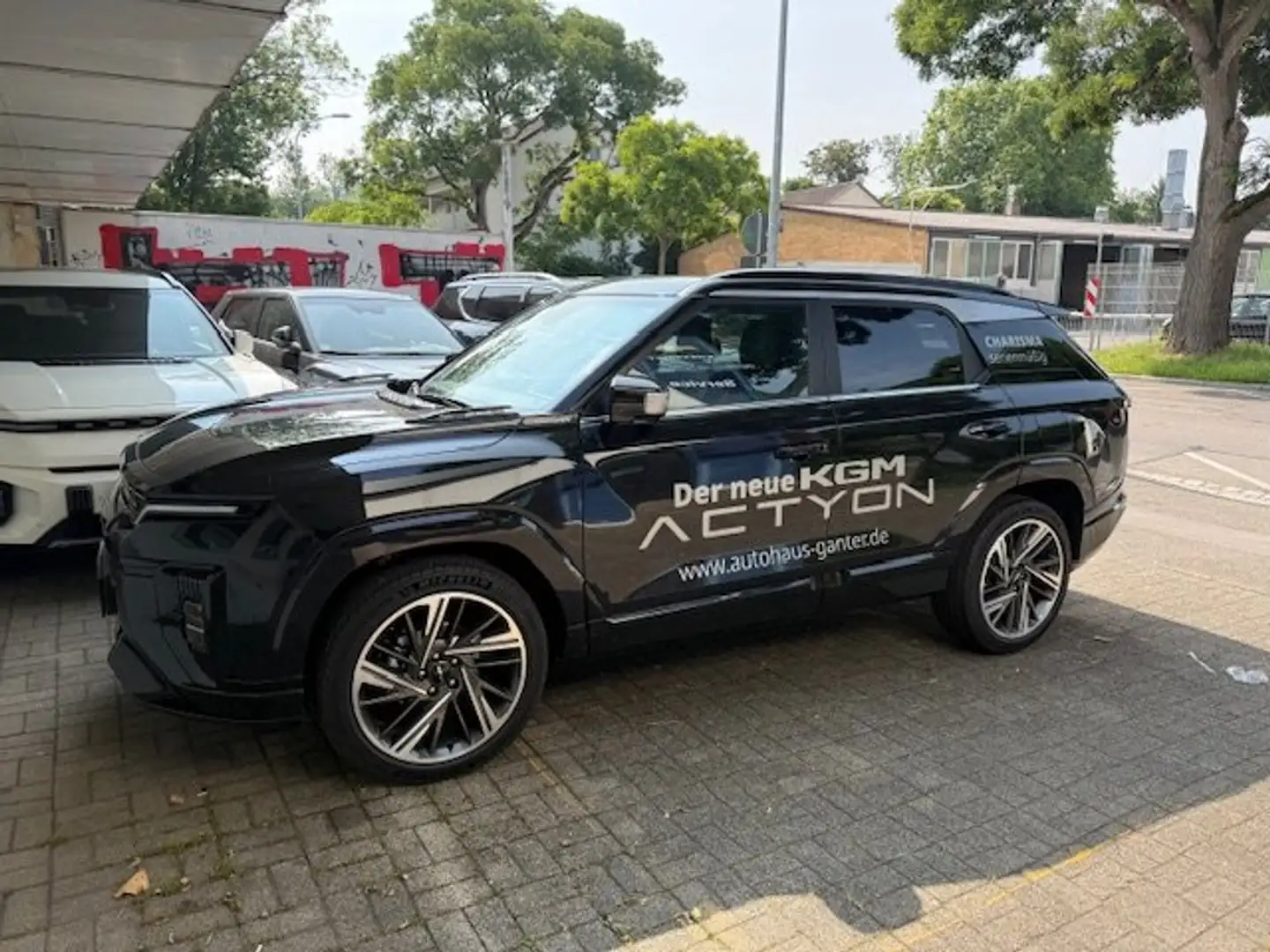 KGM Actyon 1.5 Benzin 6A/T LUX 4WD Schwarz - 1