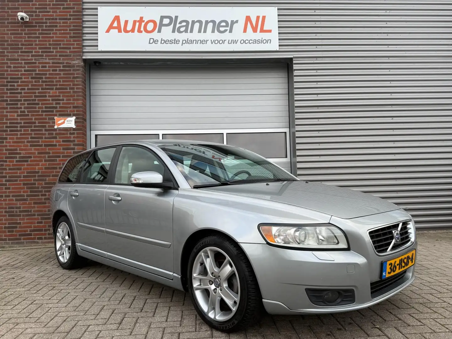 Volvo V50 2.0 Edition II! Clima! Cruise! Leder! Navi! PDC! Grijs - 1