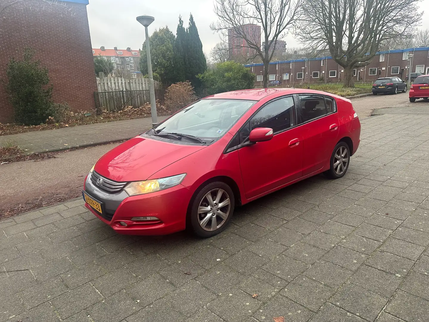 Honda Insight 1.3 Elegance IMA Automaat Airco Cruise PDC Красный - 1
