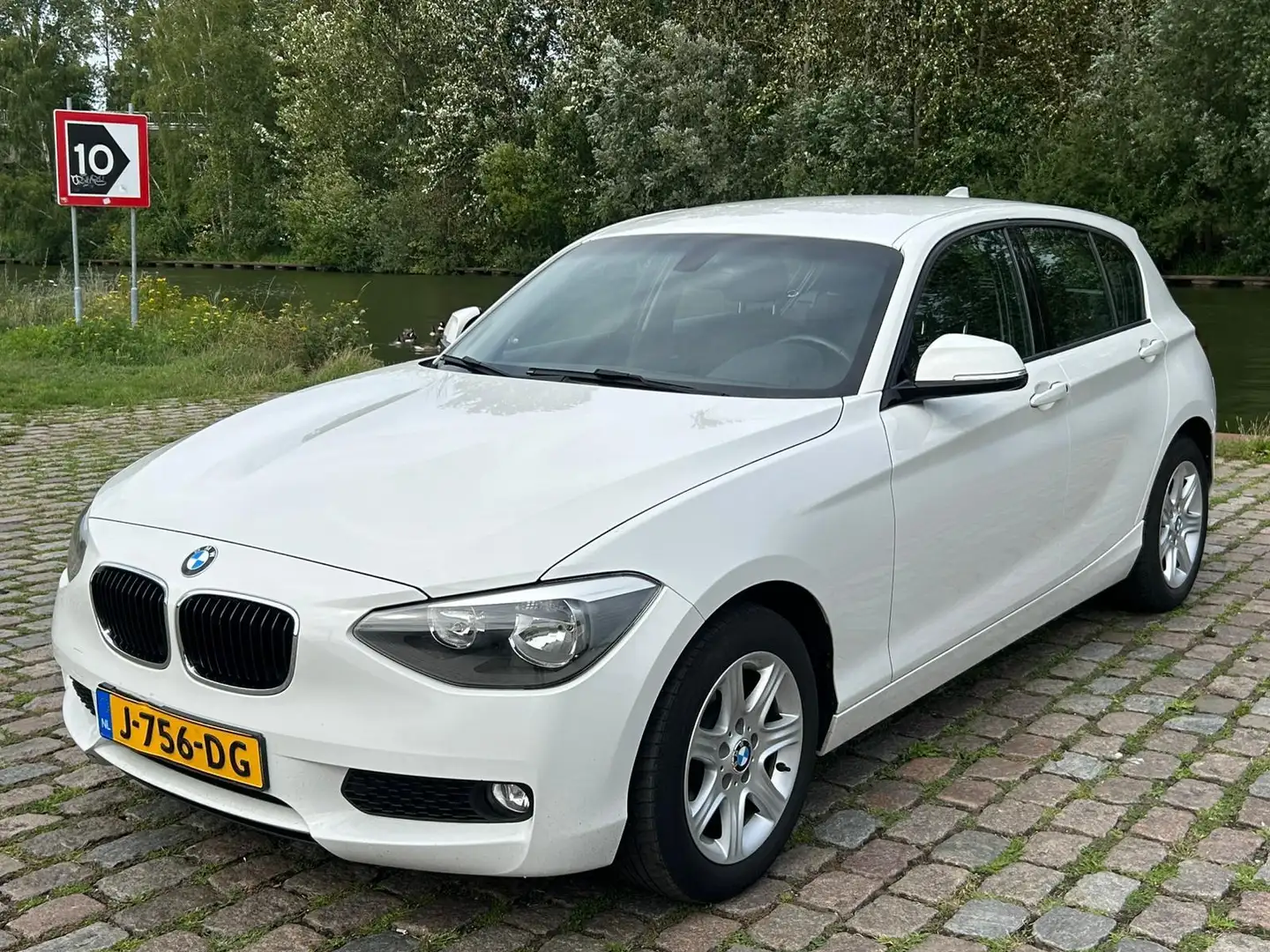 BMW 114 1-serie 114i EDE airco cruis control cv op afs ele Wit - 2