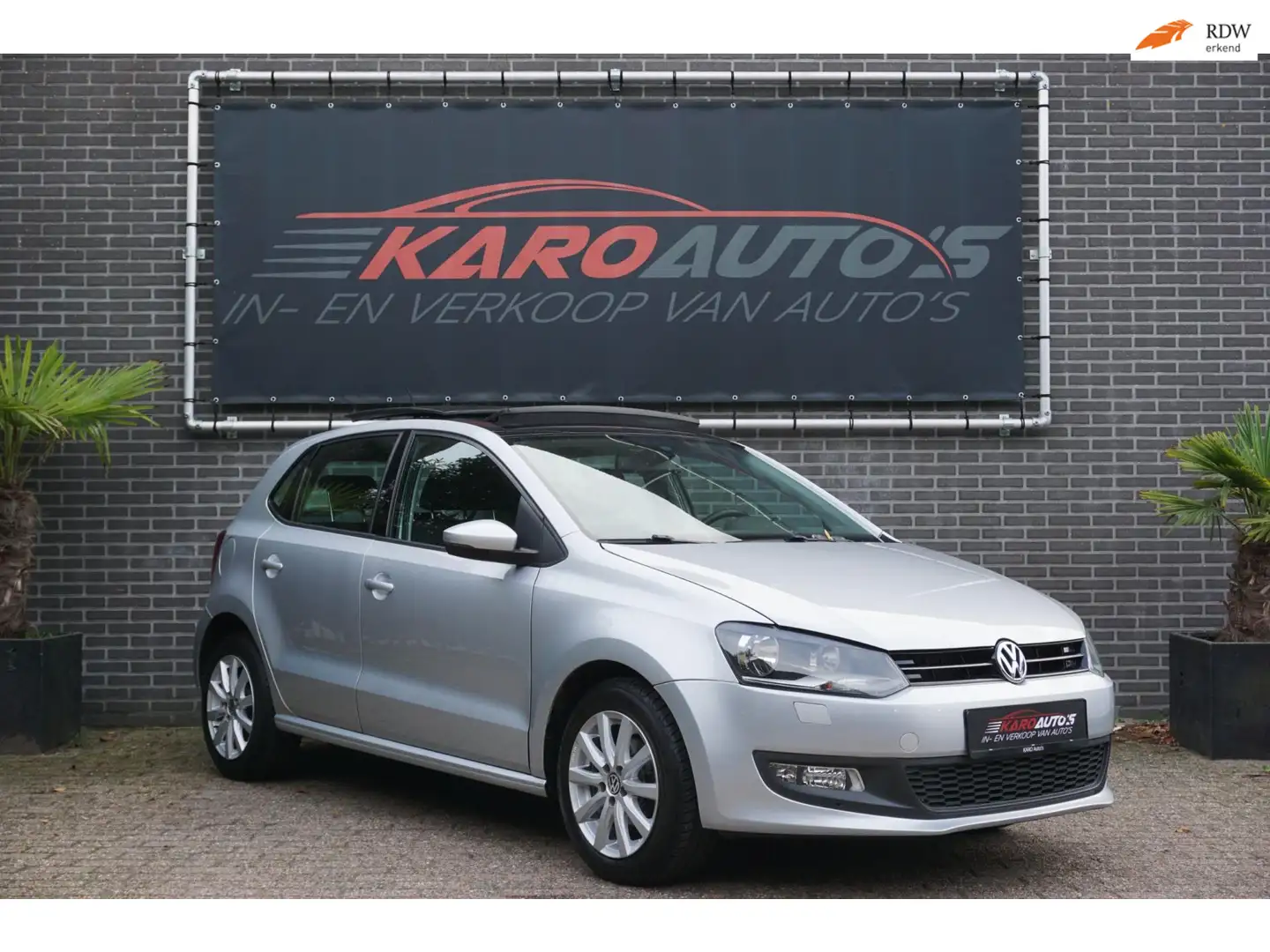 Volkswagen Polo 1.4-16V Highl Pano Navi Cruise Clima stoelv Gris - 1