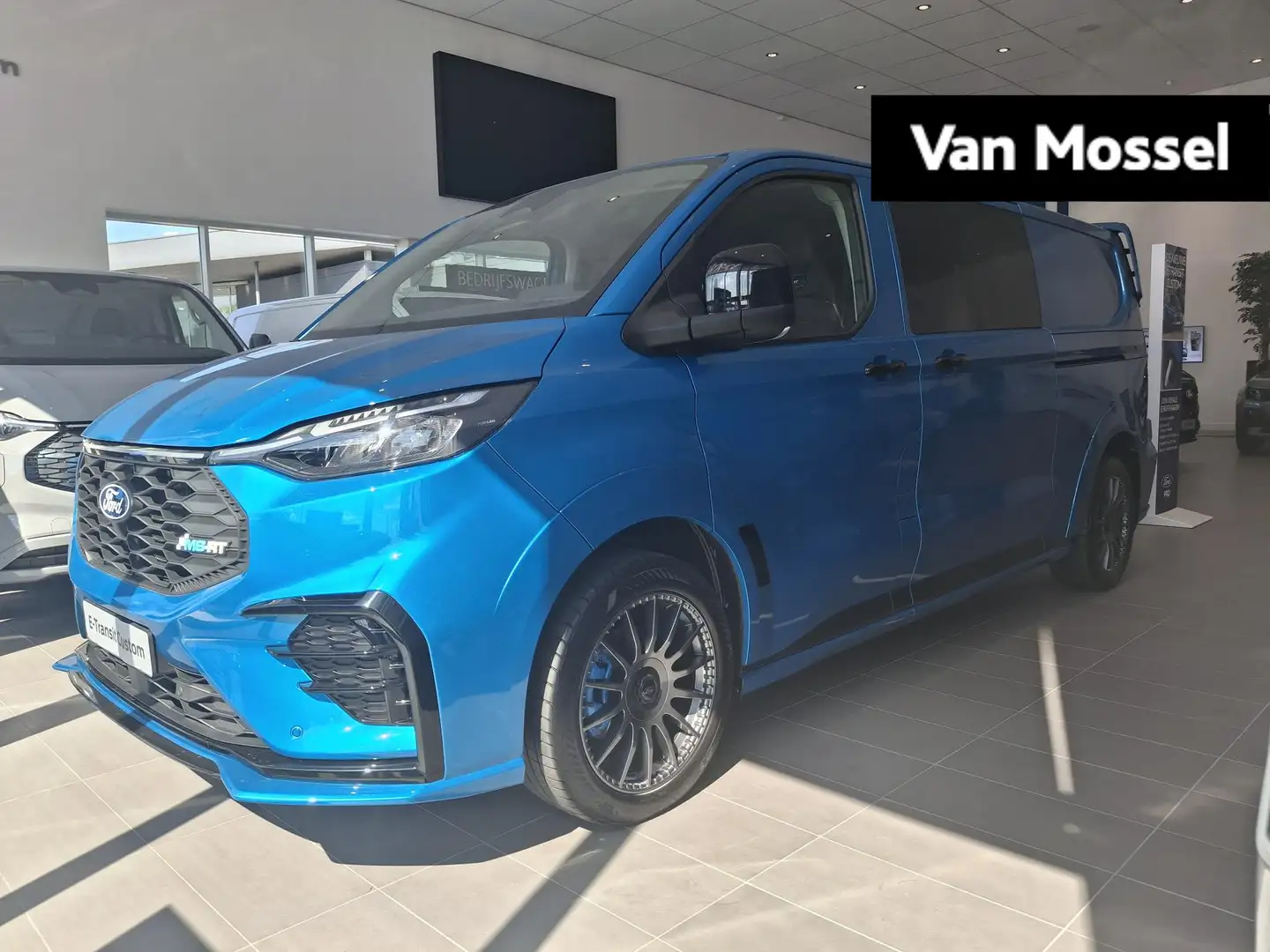 Ford Transit Custom E-Transit 320 L2H1 MS-RT 65 kWh | MS-RT SPORTSTOEL Blauw - 1