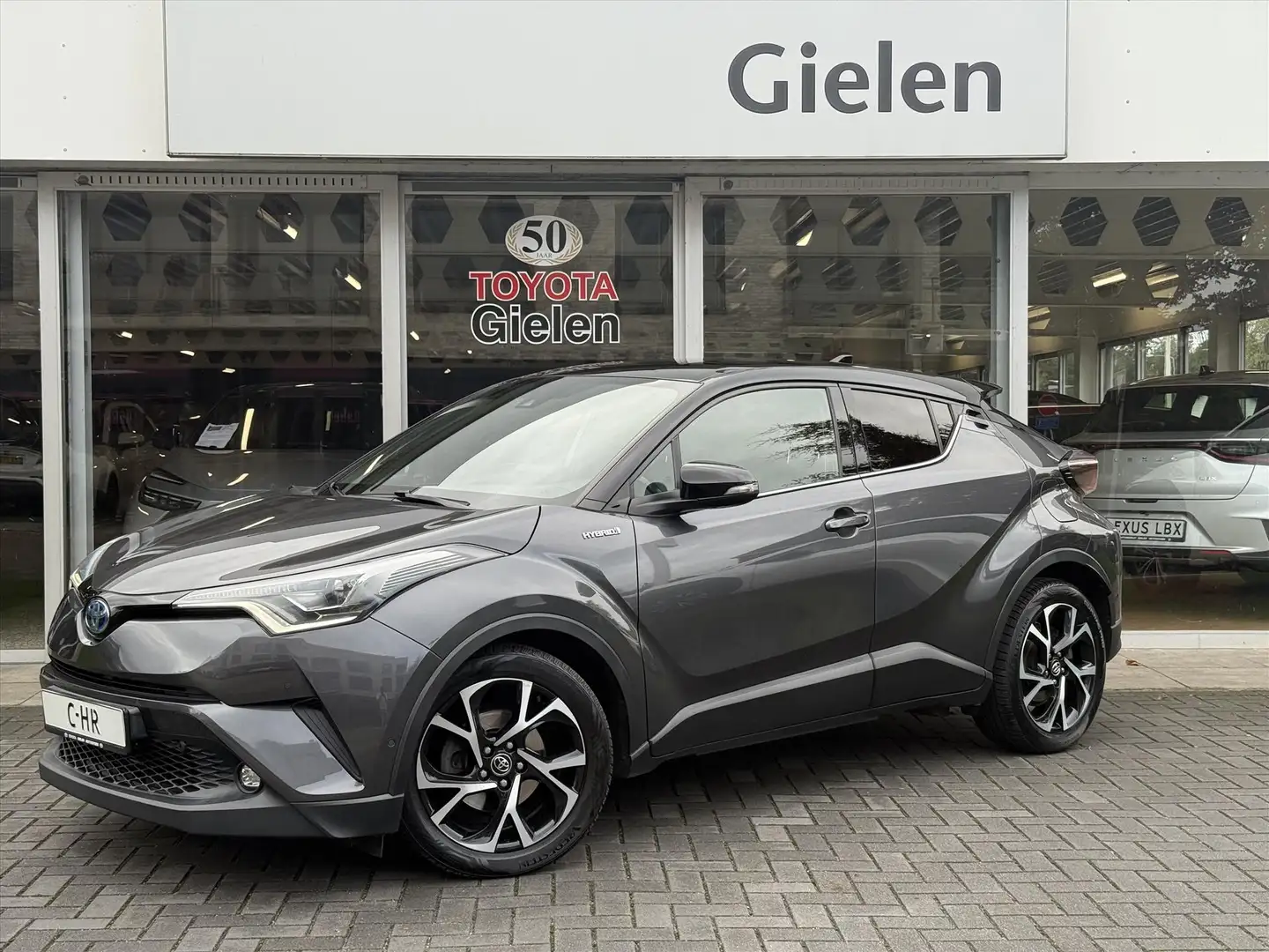 Toyota C-HR 1.8 Hybrid Bi-Tone Plus | Leer, Stoel + Stuurverwa Grau - 1