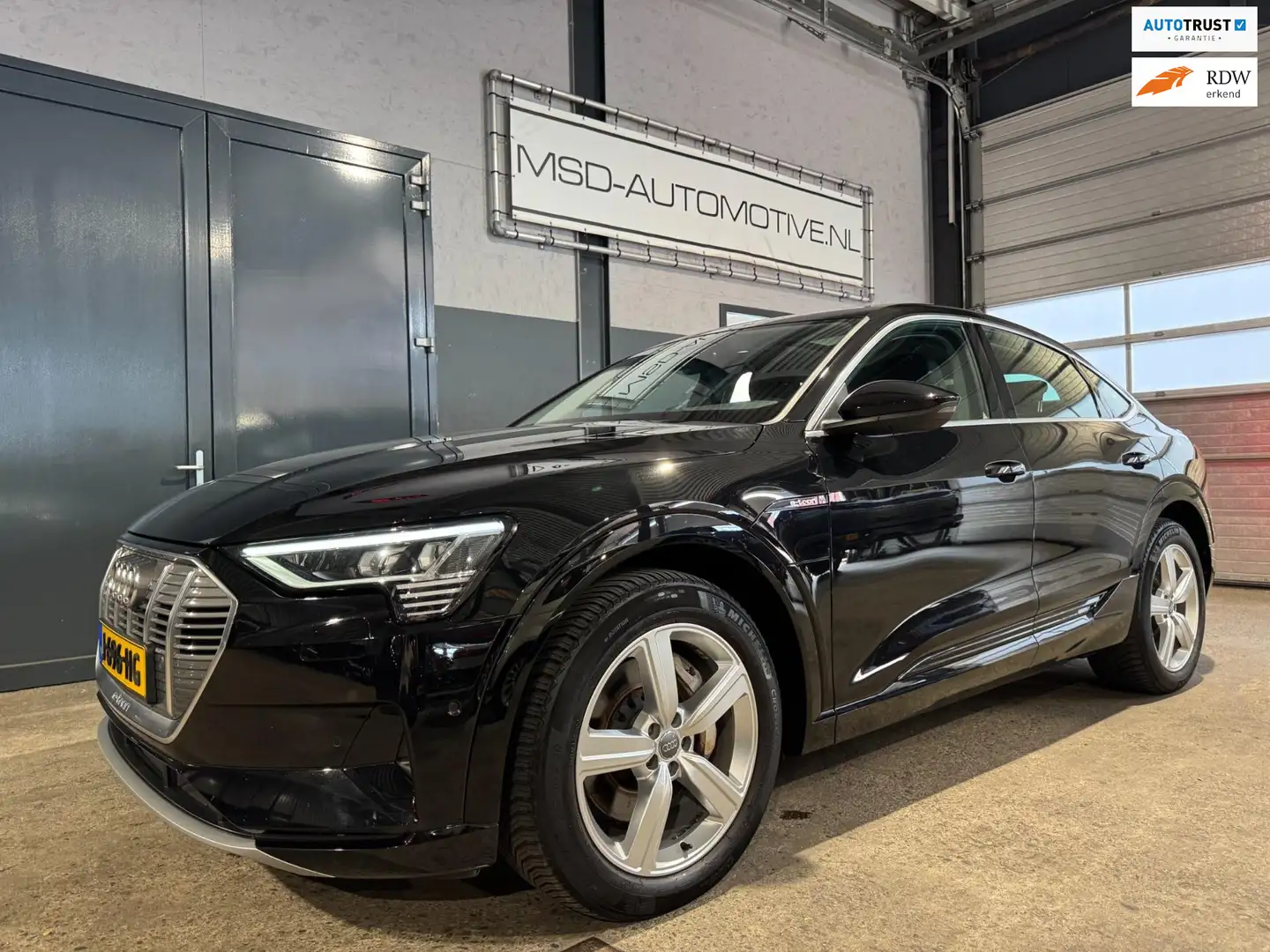 Audi e-tron Sportback 55 quattro Business Edition Plus 95 kWh Zwart - 1