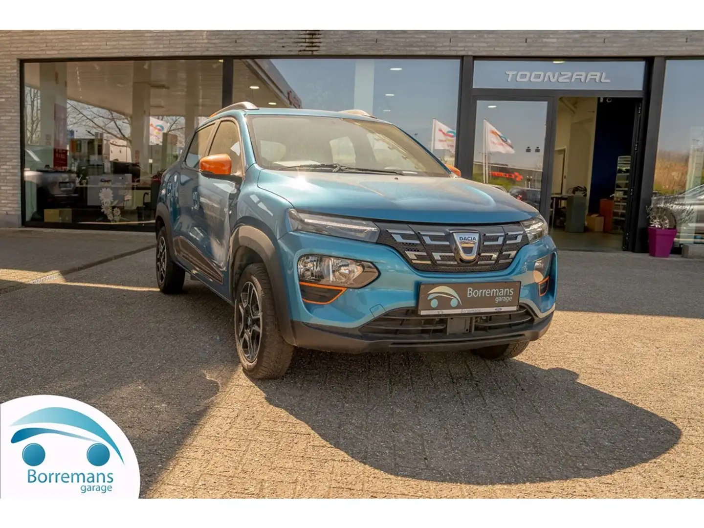 Dacia Spring 27 KWH COMFORT PLUS NAVI/BLUETOOTH/ LEDER/... Bleu - 1