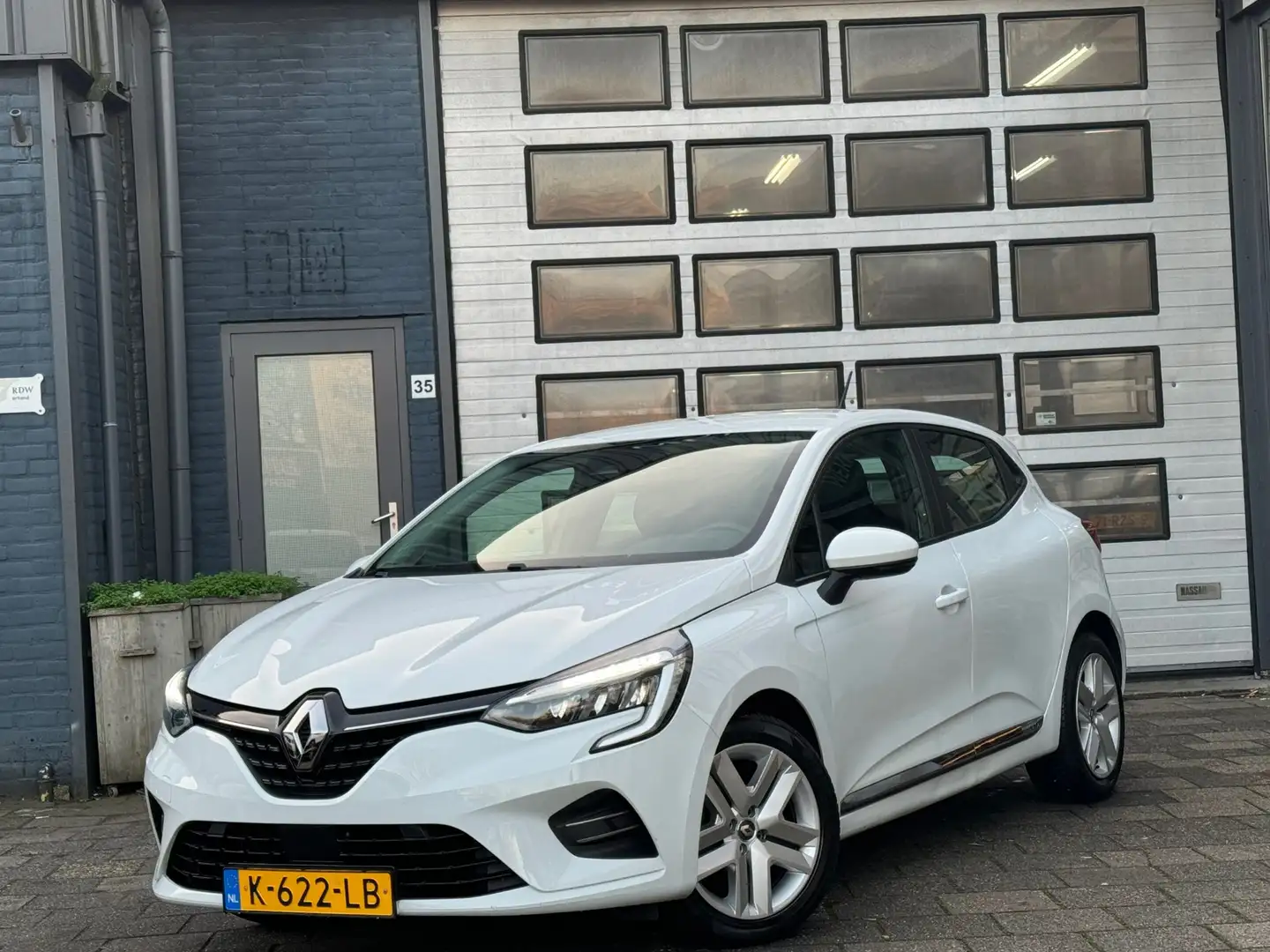 Renault Clio 1.0 TCe Zen | Airco | Navi | Cruise | N.A.P Weiß - 1