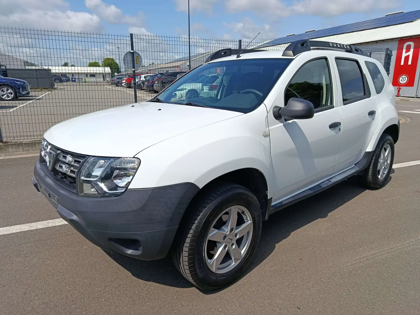 Dacia Duster 1.6i 4x2 Ambiance Euro6 Airco Blanc - 1
