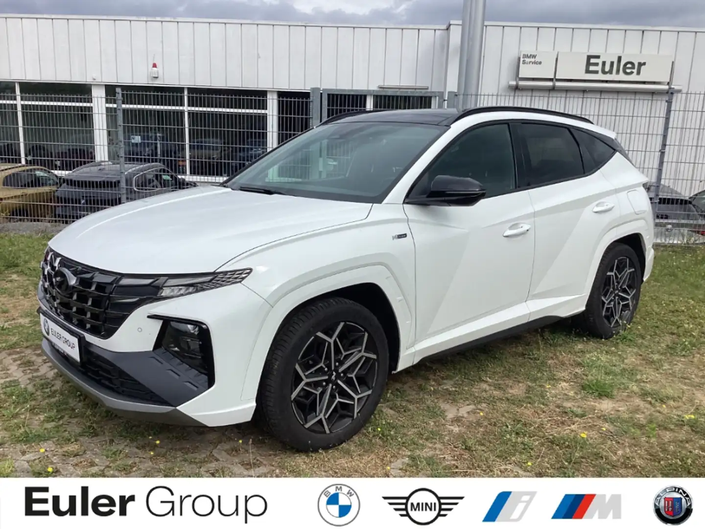Hyundai TUCSON 1.6 T-GDi HEV 4WD AHK Pano Navi Hifi LED ACC Kamer Wit - 1