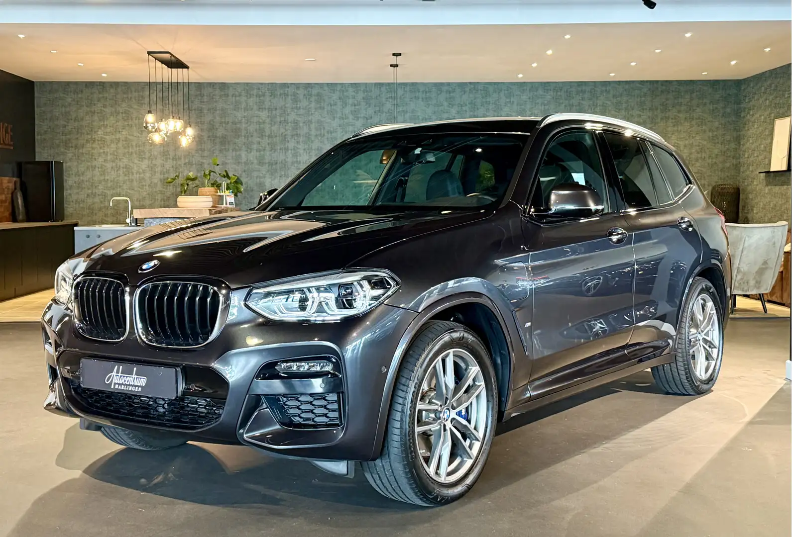 BMW X3 xDrive30e High Exe M-Pakket I Pano I Camera Gris - 1