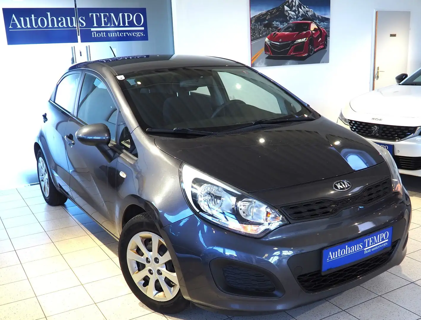 Kia Rio 1,2 MPI Titan Grau - 1