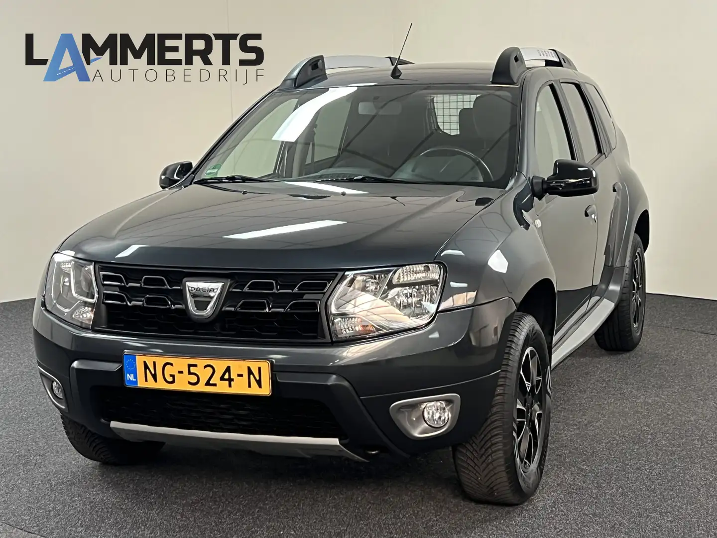 Dacia Duster 1.2 TCe 4x2 Blackshadow Navi/Camera/leder Gris - 1