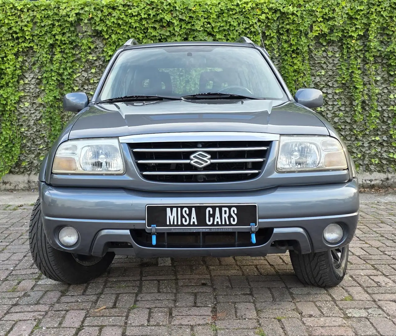 Suzuki Grand Vitara 1.6 Metal Top FreeStyle-3 Airco 4x4 Leer Wilde Bod Gri - 2