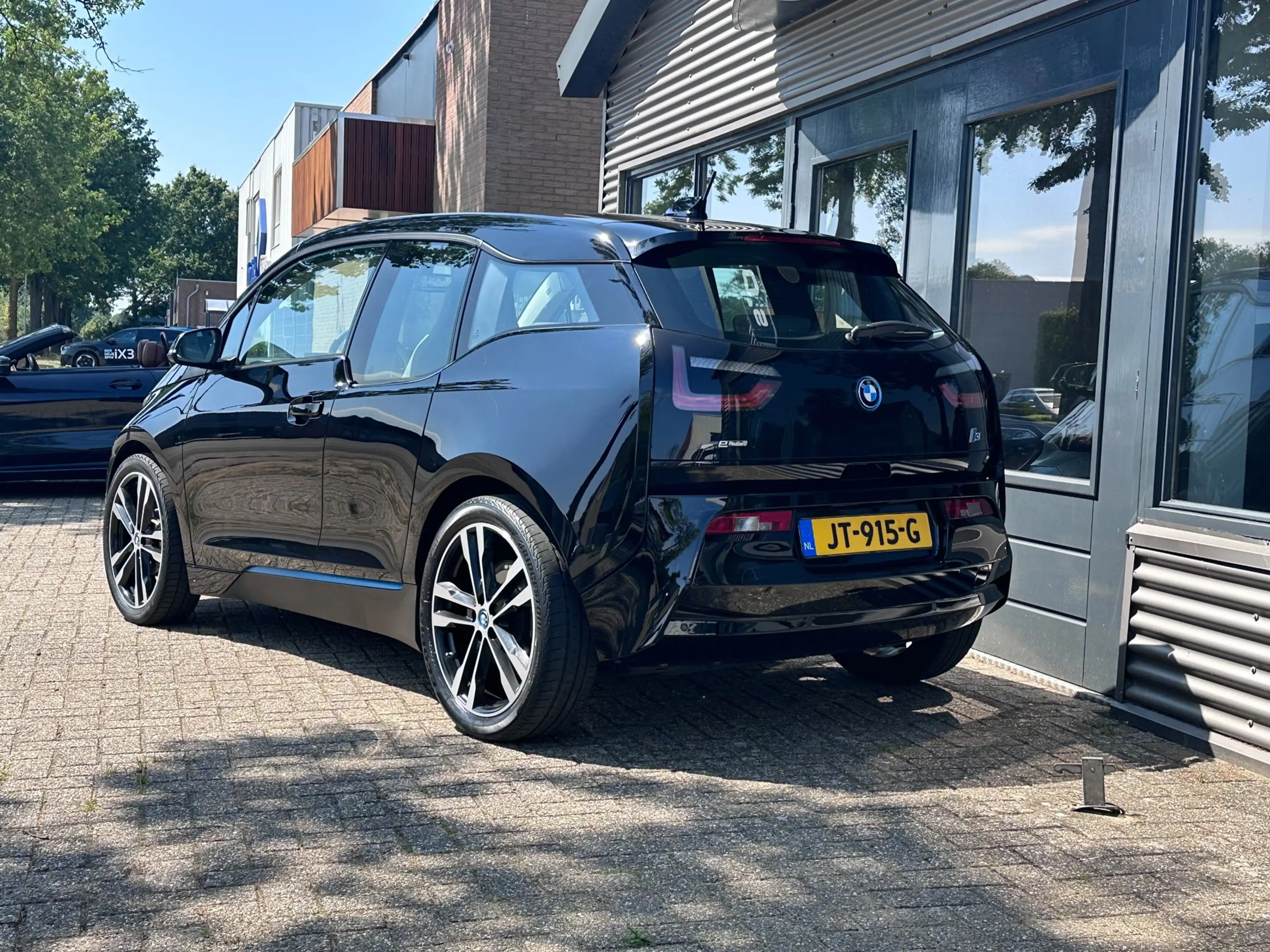BMW i3 22 kWh WARMTEPOMP /SOH 86% / 20"/ NL-Auto / Leer / — photo 5