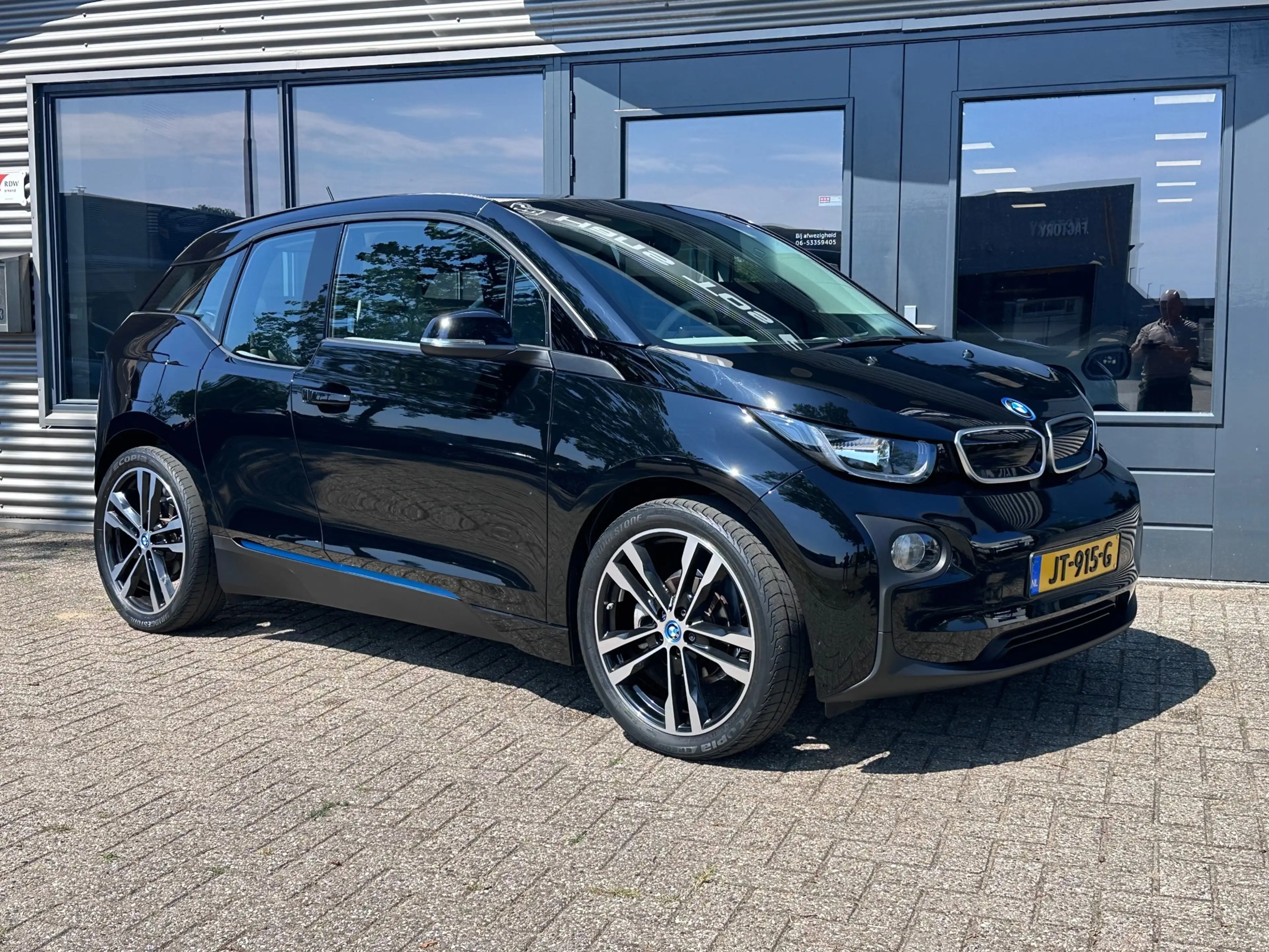 BMW i3 22 kWh WARMTEPOMP /SOH 86% / 20"/ NL-Auto / Leer / — photo 11