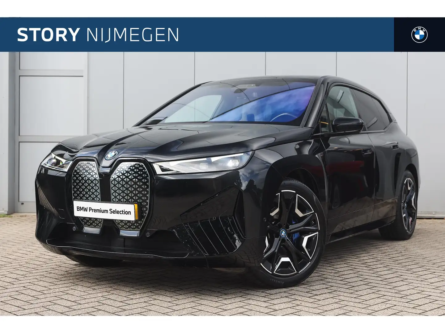 BMW iX xDrive40 / Sportpakket / Panoramadak Sky Lounge / Nero - 1
