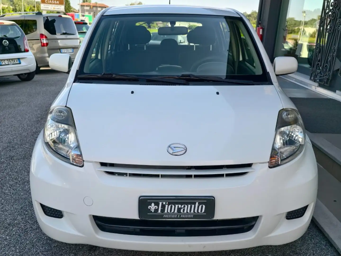 Daihatsu Sirion 1.3 Taka 4WD GPL 4X4 Weiß - 1