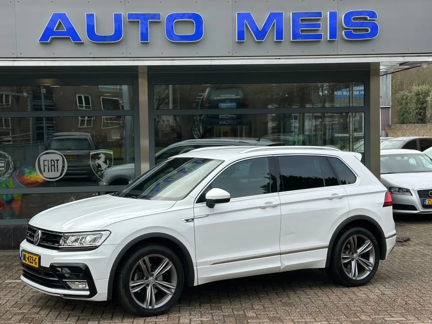 Volkswagen Tiguan 1.4 TSI ACT HIGHL. Navi Trekhaak Cruise Airco Weiß - 1