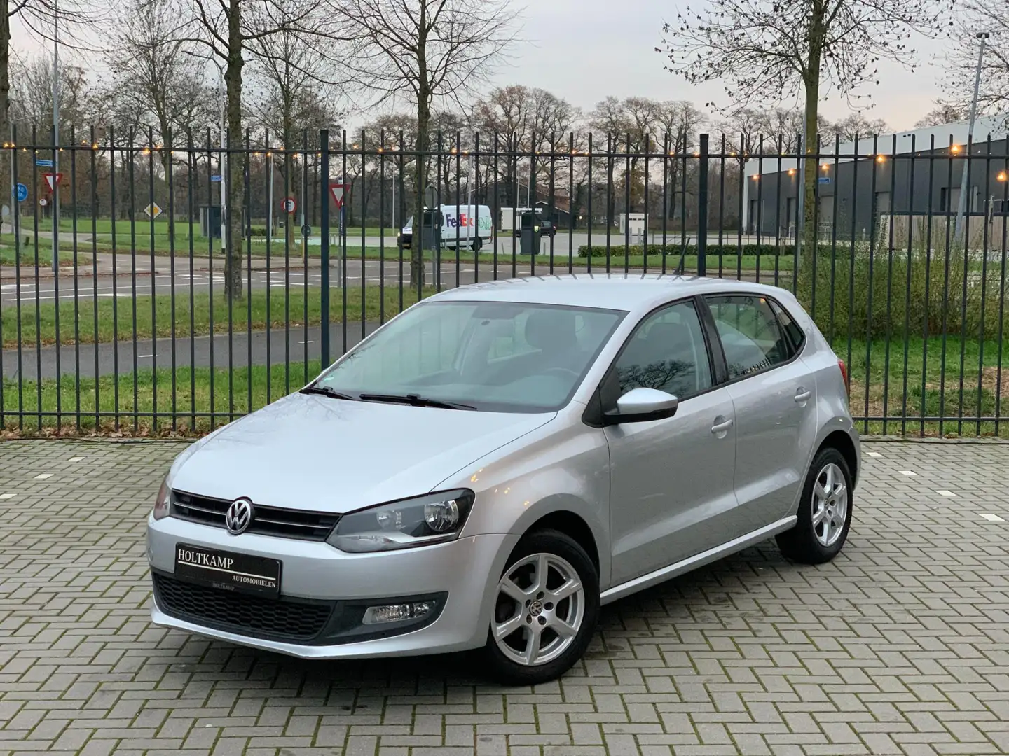 Volkswagen Polo 1.2-12V Comfortline | CRUISE | AIRCO | PDC Zilver - 1