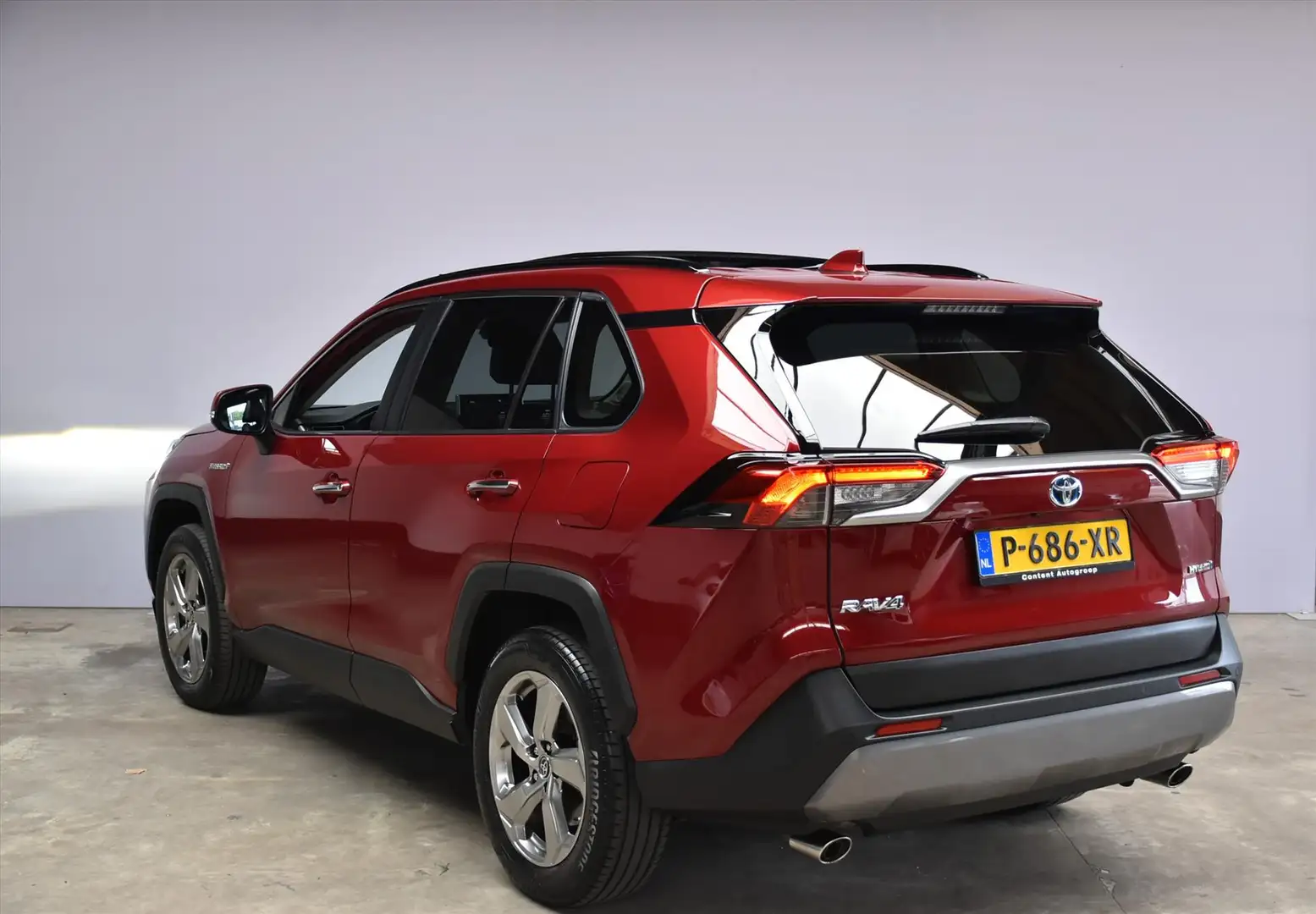 Toyota RAV 4 2.5 Hybrid 218pk CVT Executive PANO DAK Rouge - 2