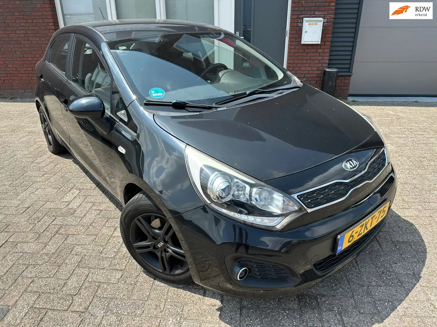 Kia Rio 1.2 CVVT BusinessLine / Airco / Cruise / 5DRS / NA Schwarz - 1