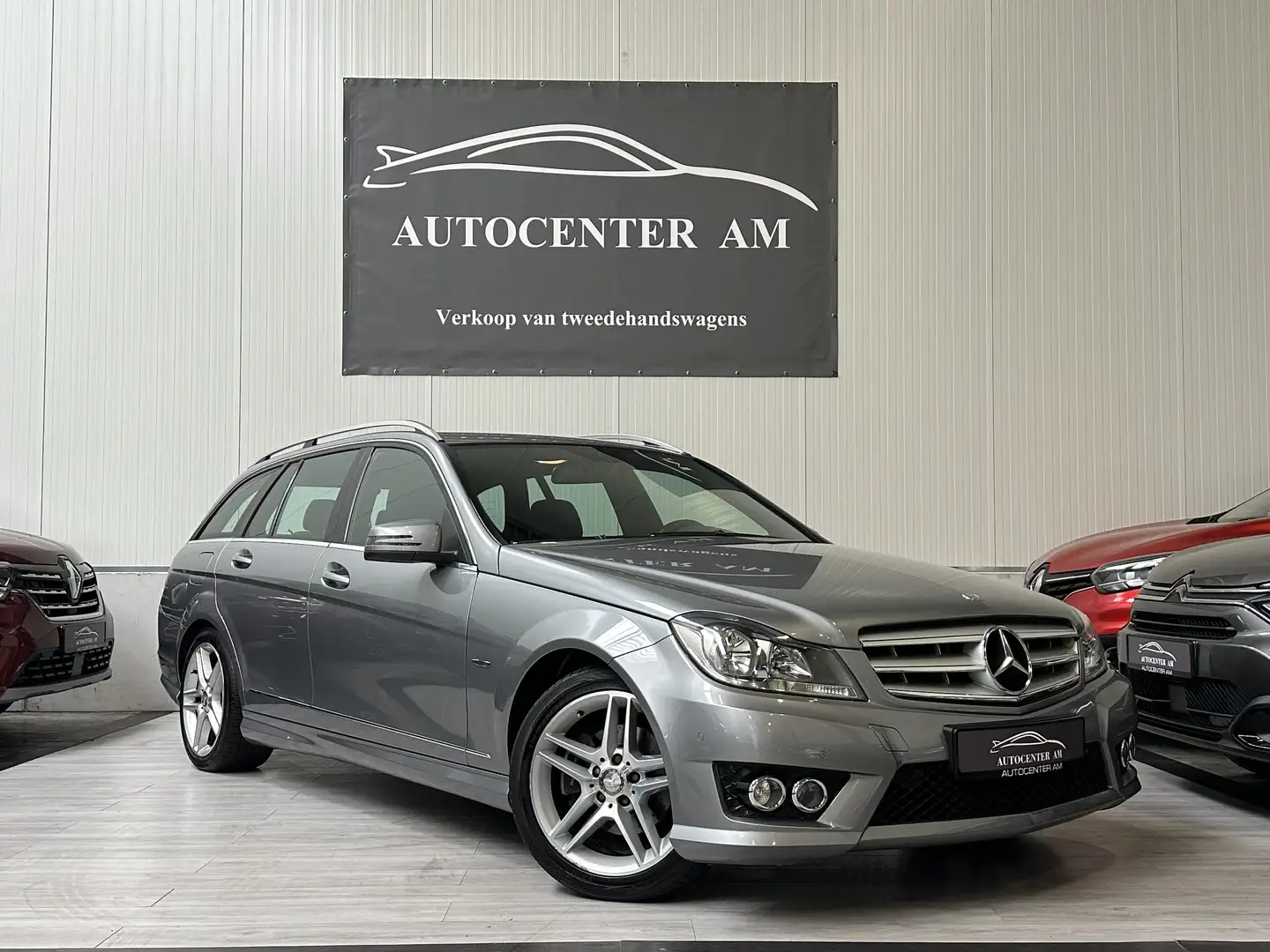 Mercedes-Benz C 200 2.2 D CDI DPF BlueEFFICIENCY AMG Pack 12M Garantie Grijs - 1
