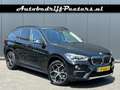 BMW X1 sDrive20i Aut. Navi LED Cruise PDC E.klep Trekhaak Zwart - thumbnail 1