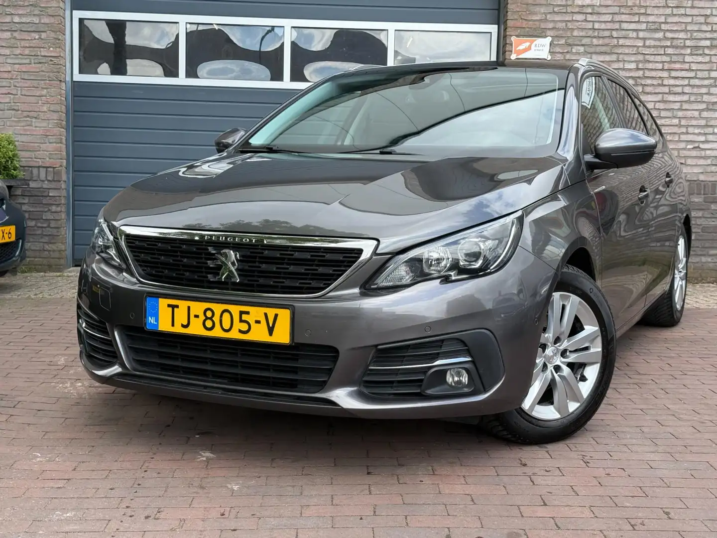 Peugeot 308 SW 1.2 PureTech Blue Lease Executive|1e Eig. Grau - 2