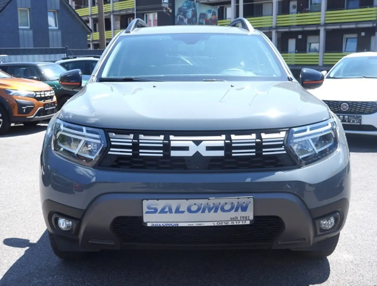Dacia Duster TCe150AUTOM*Extr+ NAVI+4 CAM+ALLW+AHK+CHROM Grau - 1