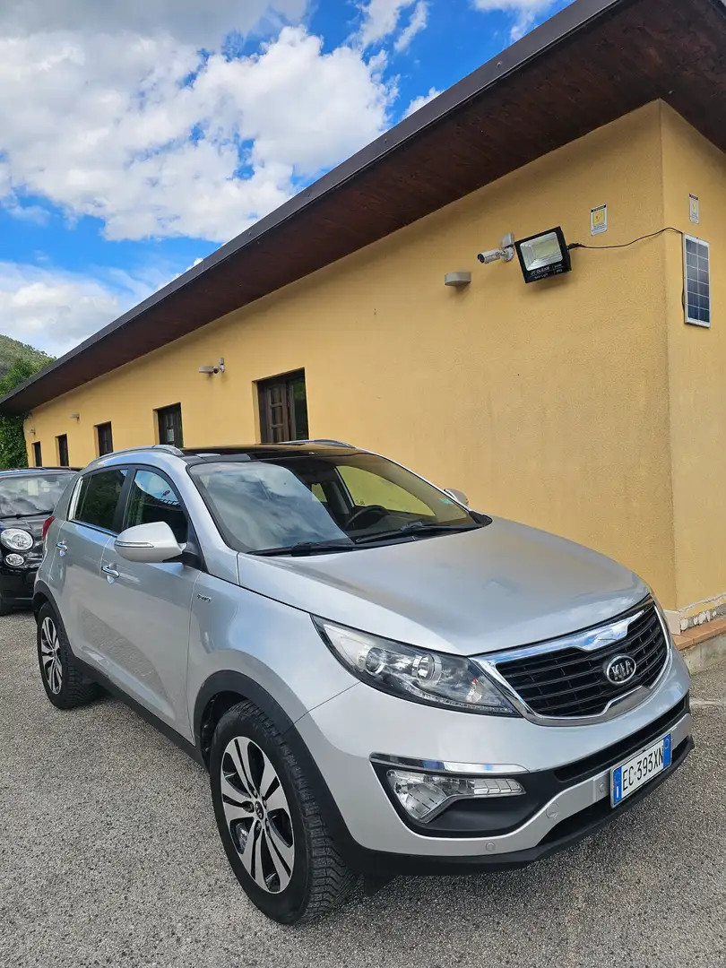 Kia Sportage KIA SPORTAGE 2.0 BENZINA-GPL AWD AUTOMATICA Stříbrná - 1