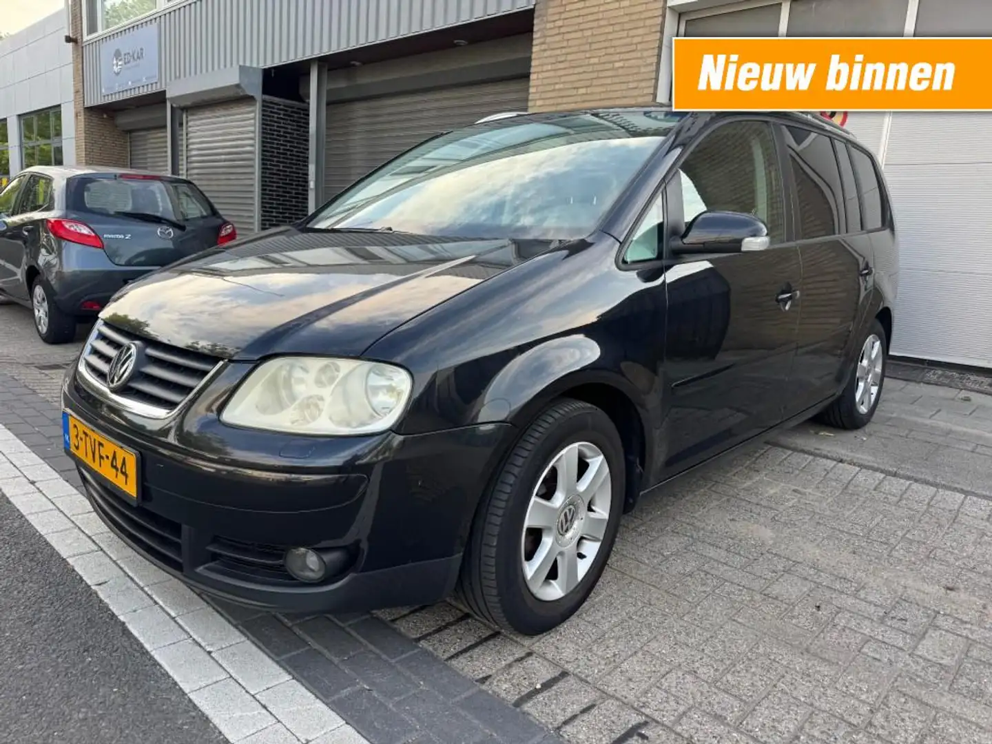 Volkswagen Touran 1.6-16V FSI Highline 7P CLIMA NAVI NETTE AUTO Noir - 1