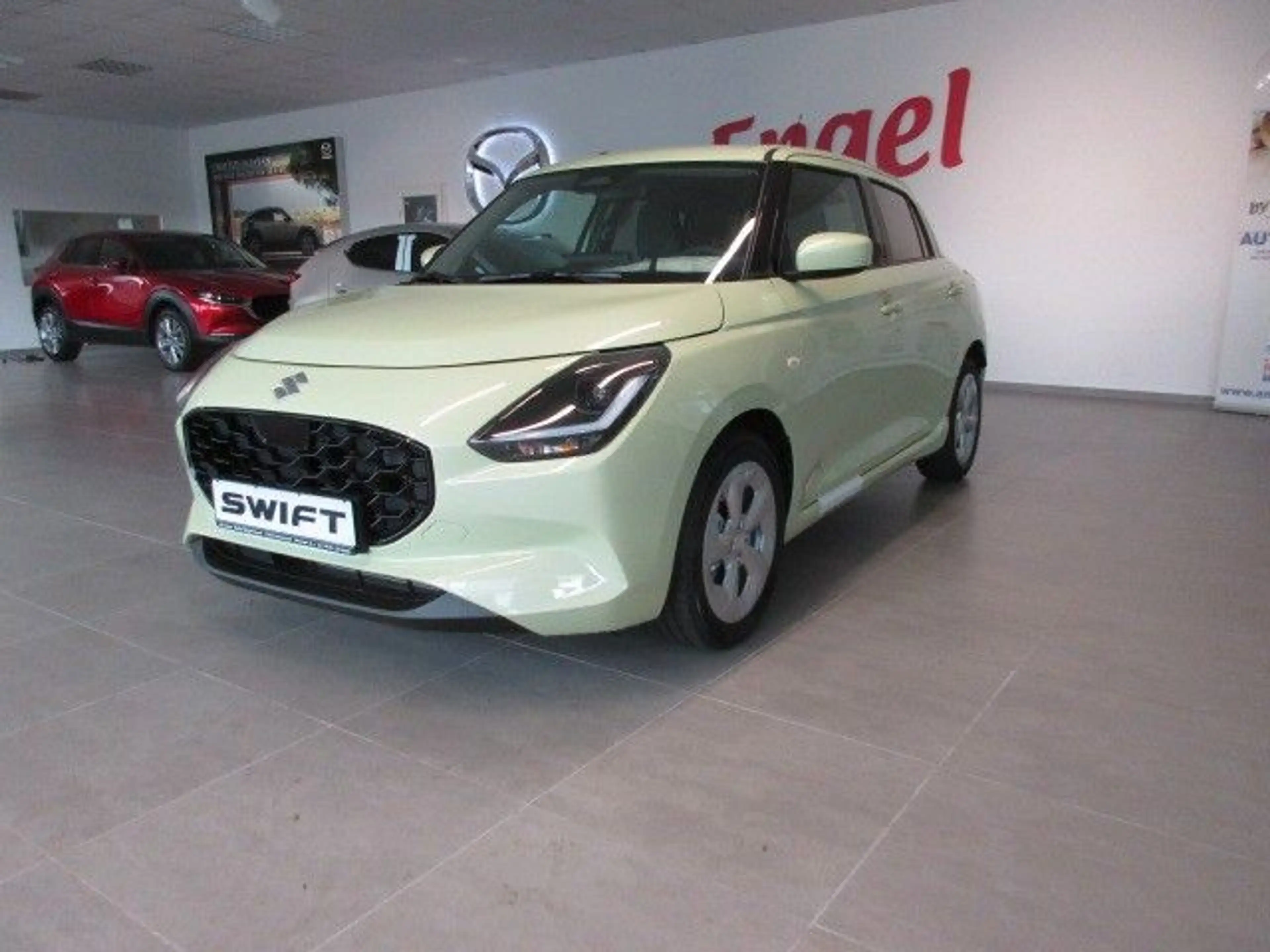 Suzuki Swift 1.2 Dualjet Hybrid Comfort+ CVT — photo 2