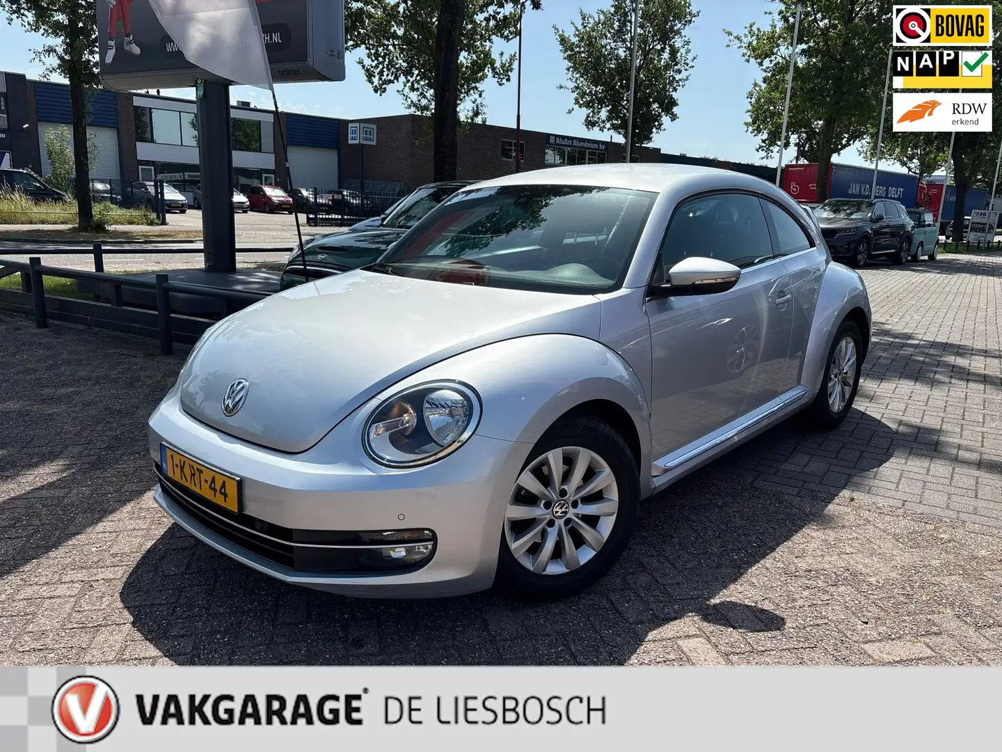 Volkswagen Beetle 1.2 TSI Design,navi,clima,mf stuur,pdc,boeken Grijs - 1